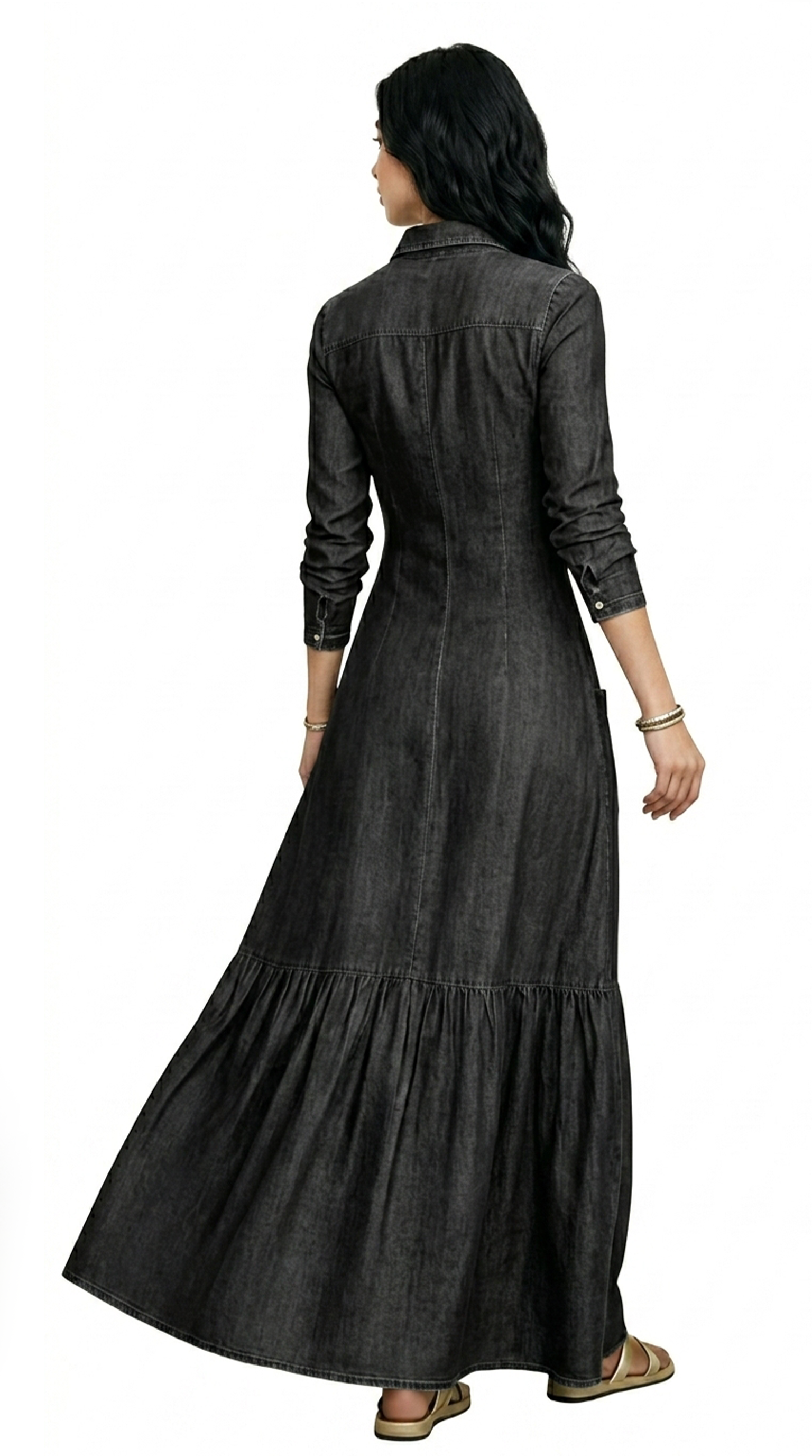 Woman wearing a brown tiered dress on a white background