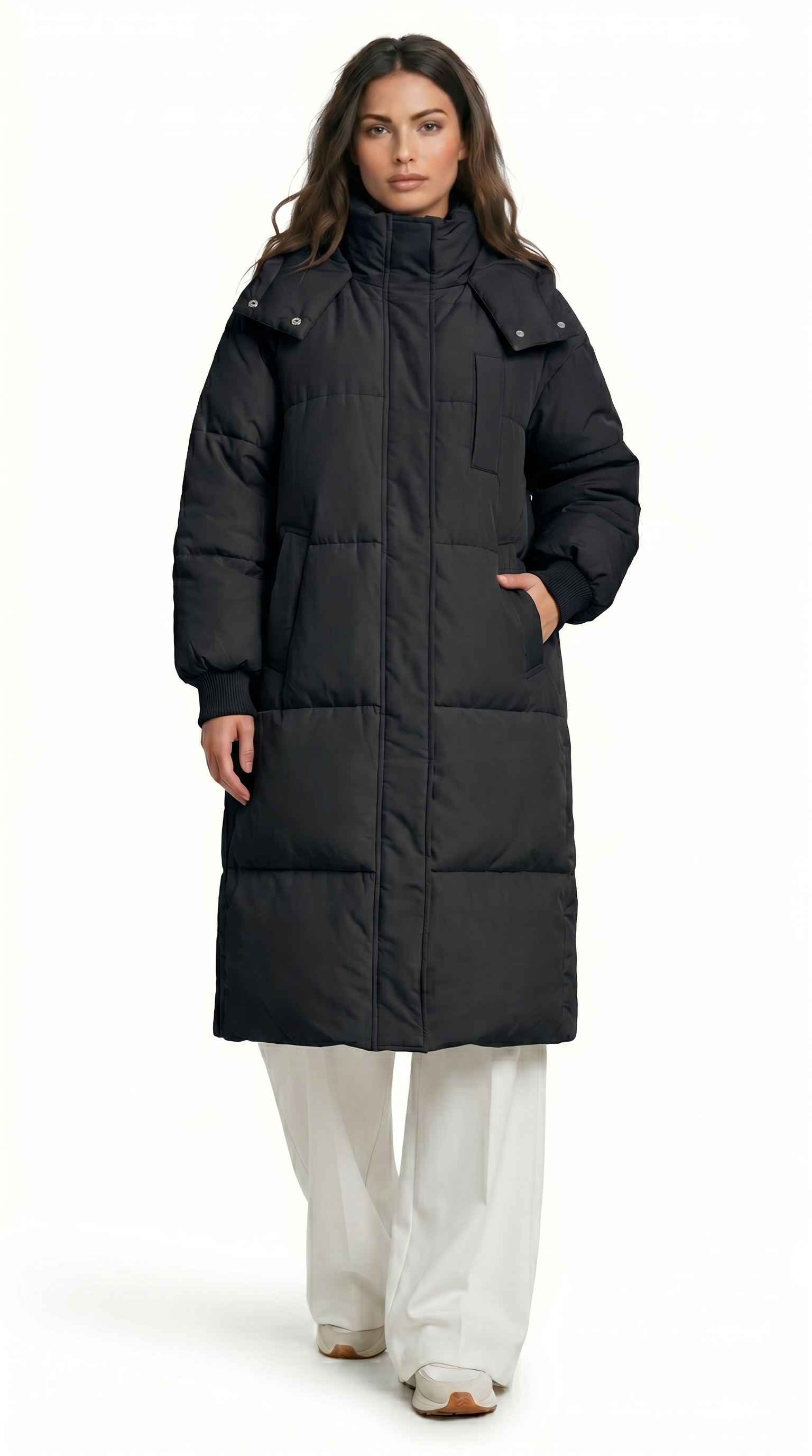 Woman wearing a long black puffer coat on a white background from Meleche Fashion USA or Meléche (short as (Mé))
