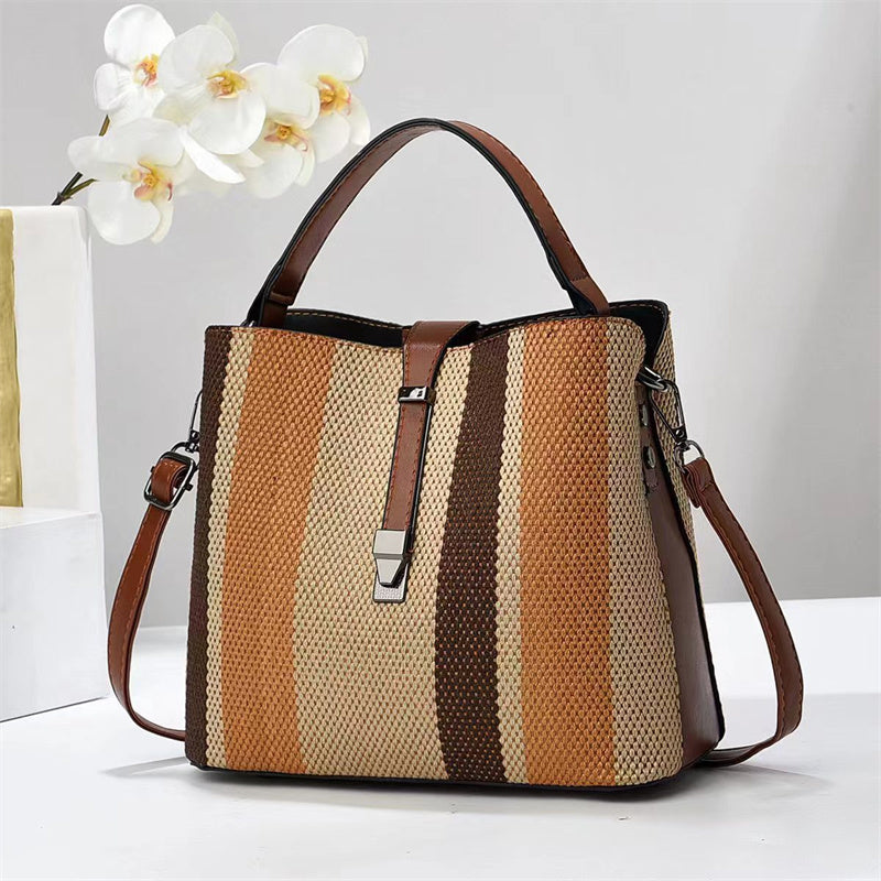 Goran Striped handbag with brown and beige pattern on a white background