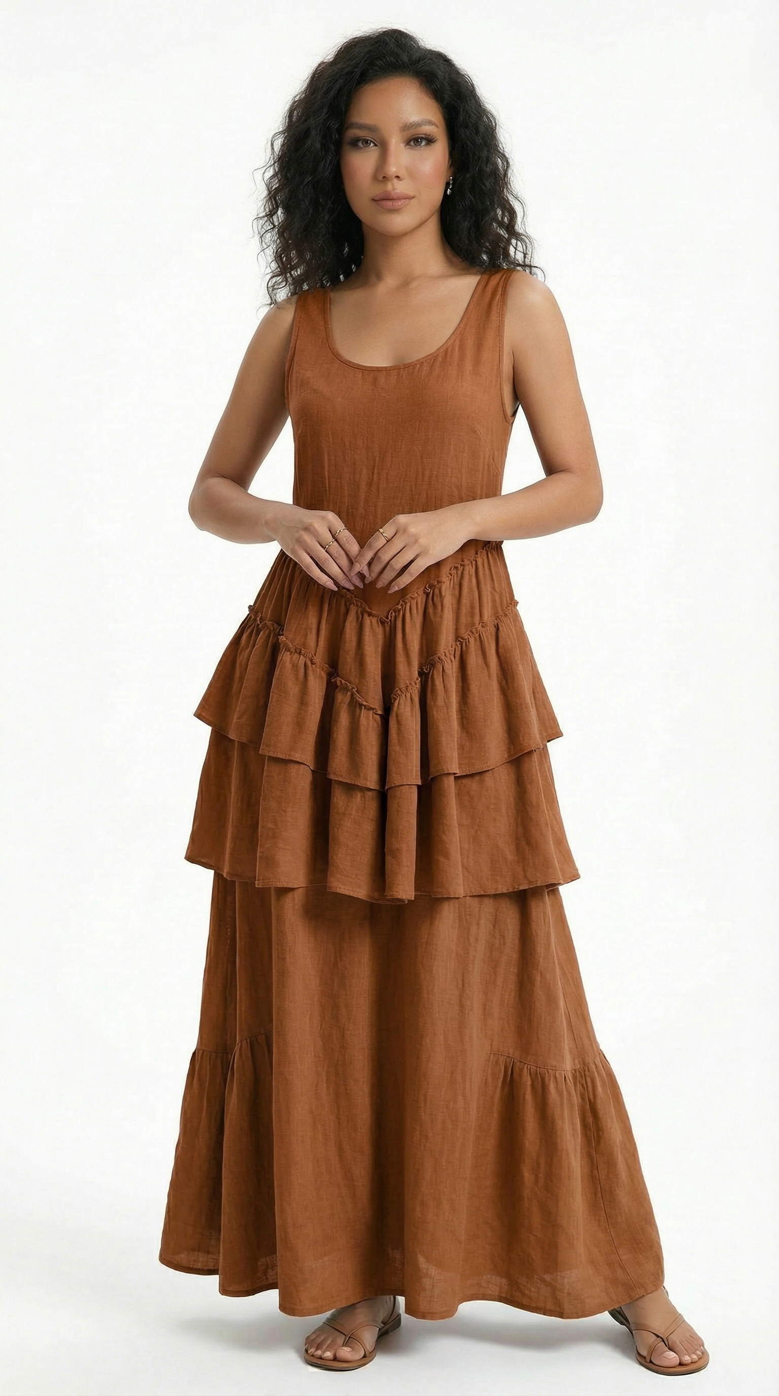 Woman wearing a dark blue dress with a white background