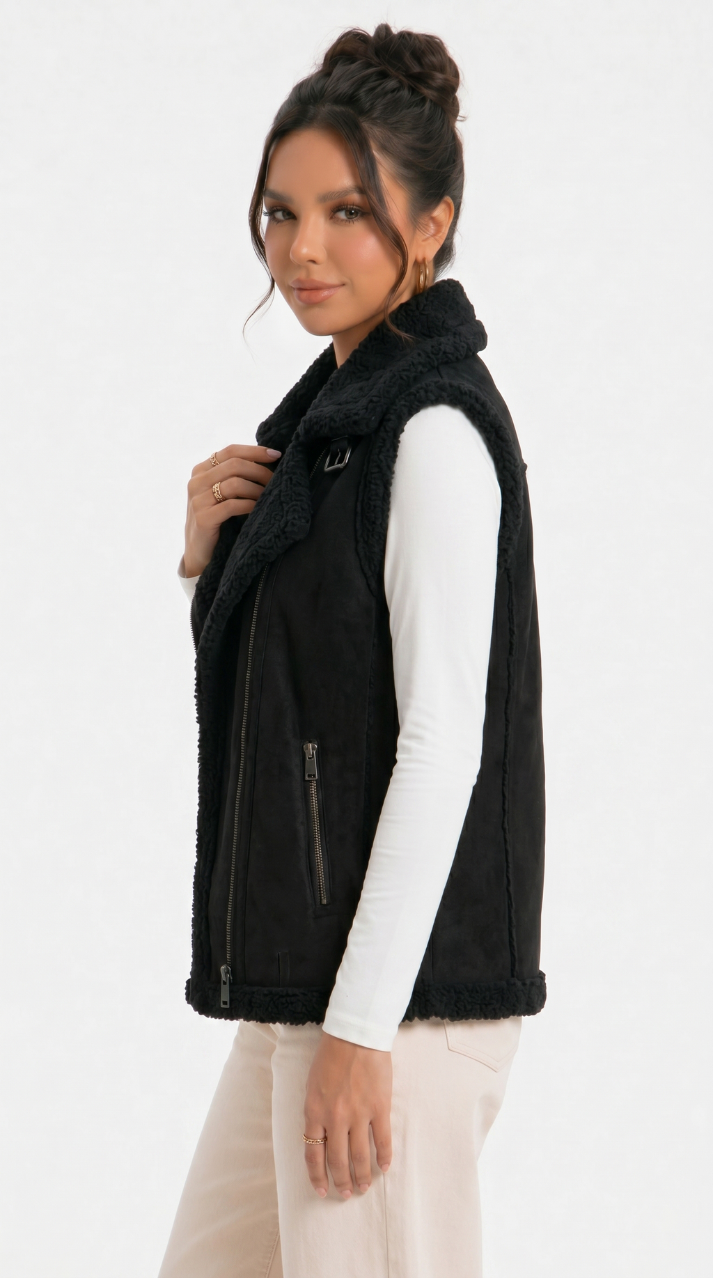 girl wearing a black vest with a plain background from Meleche Fashion USA or Meléche (short as (Mé))