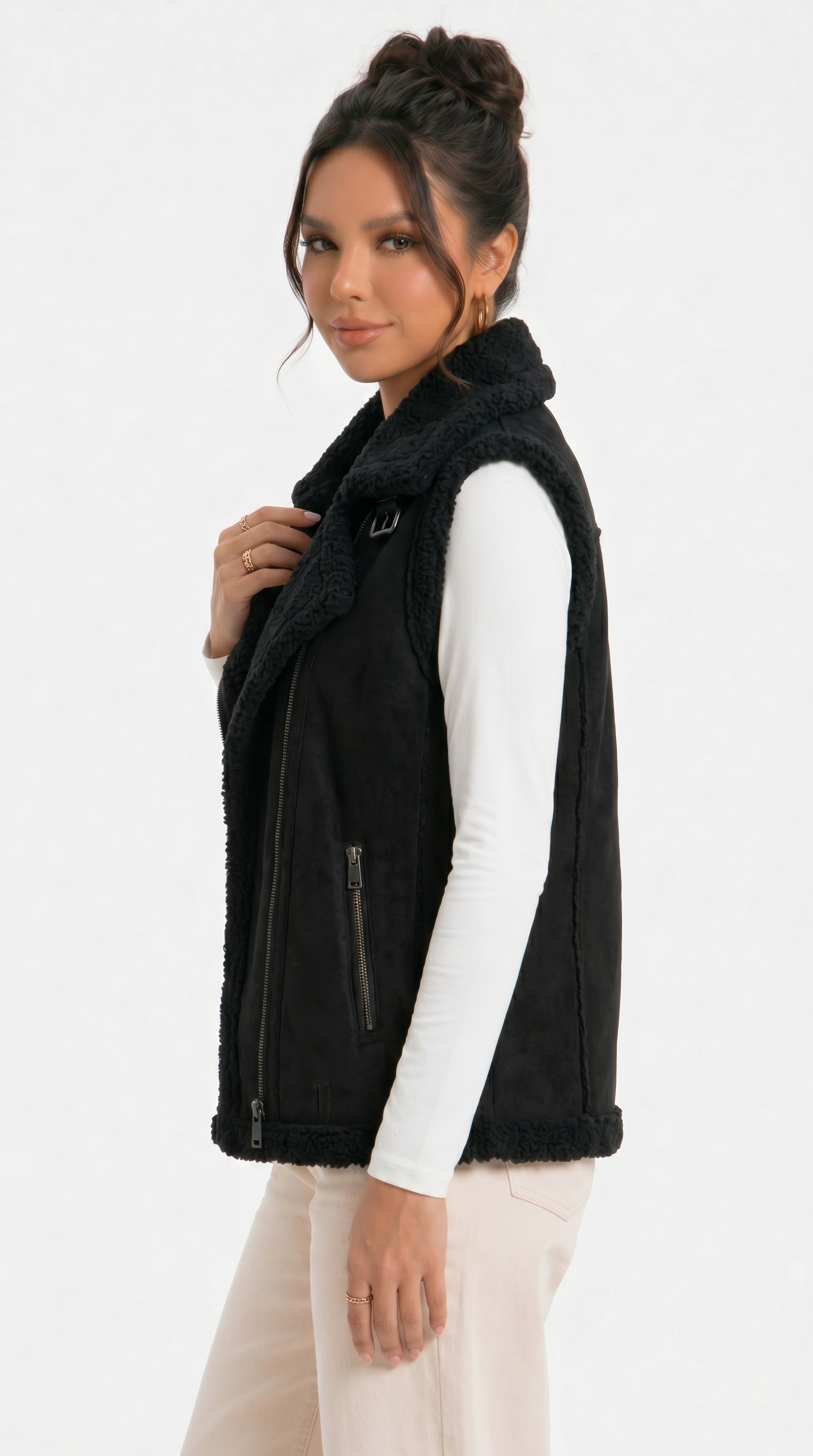 girl wearing a black vest with a plain background from Meleche Fashion USA or Meléche (short as (Mé))