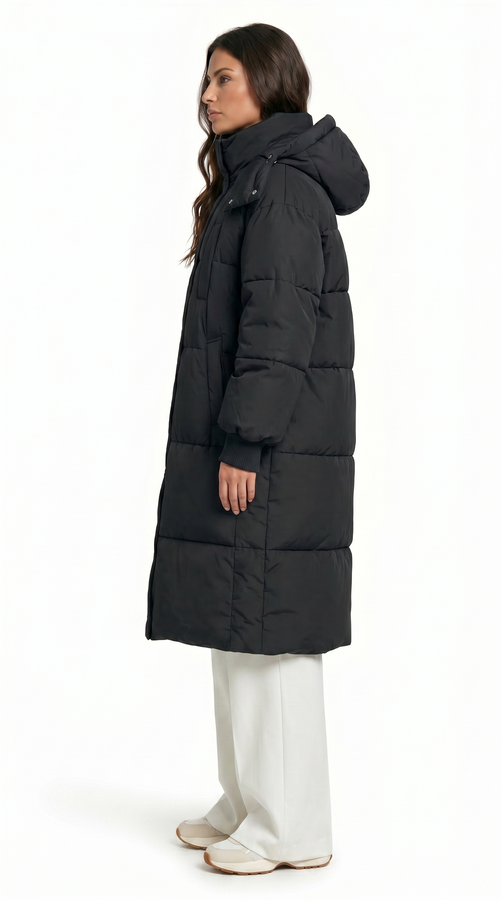 Woman wearing a black puffer coat on a white background from Meleche Fashion USA or Meléche (short as (Mé))