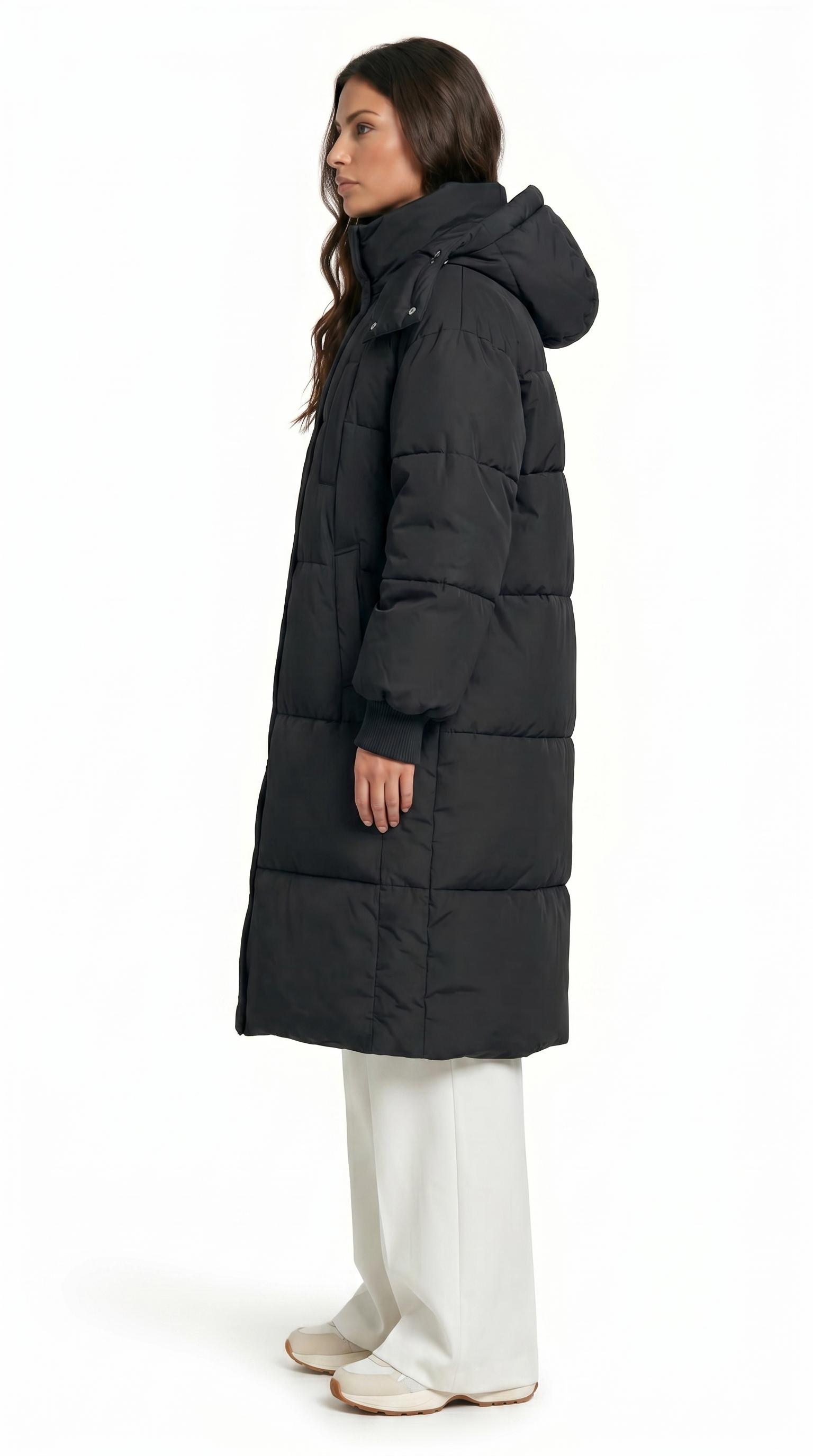 Woman wearing a black puffer coat on a white background from Meleche Fashion USA or Meléche (short as (Mé))