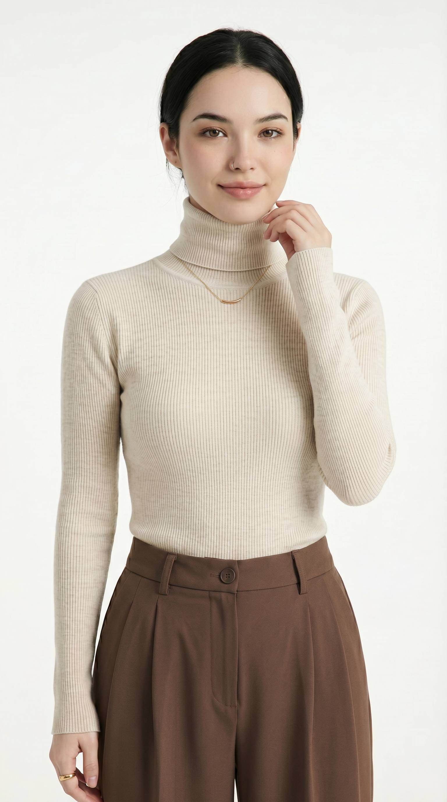 Woman wearing a black open-knit cardigan over a white top and denim 
shorts on a light gray background
from Meleche USA or Meléche (short as (Mé))