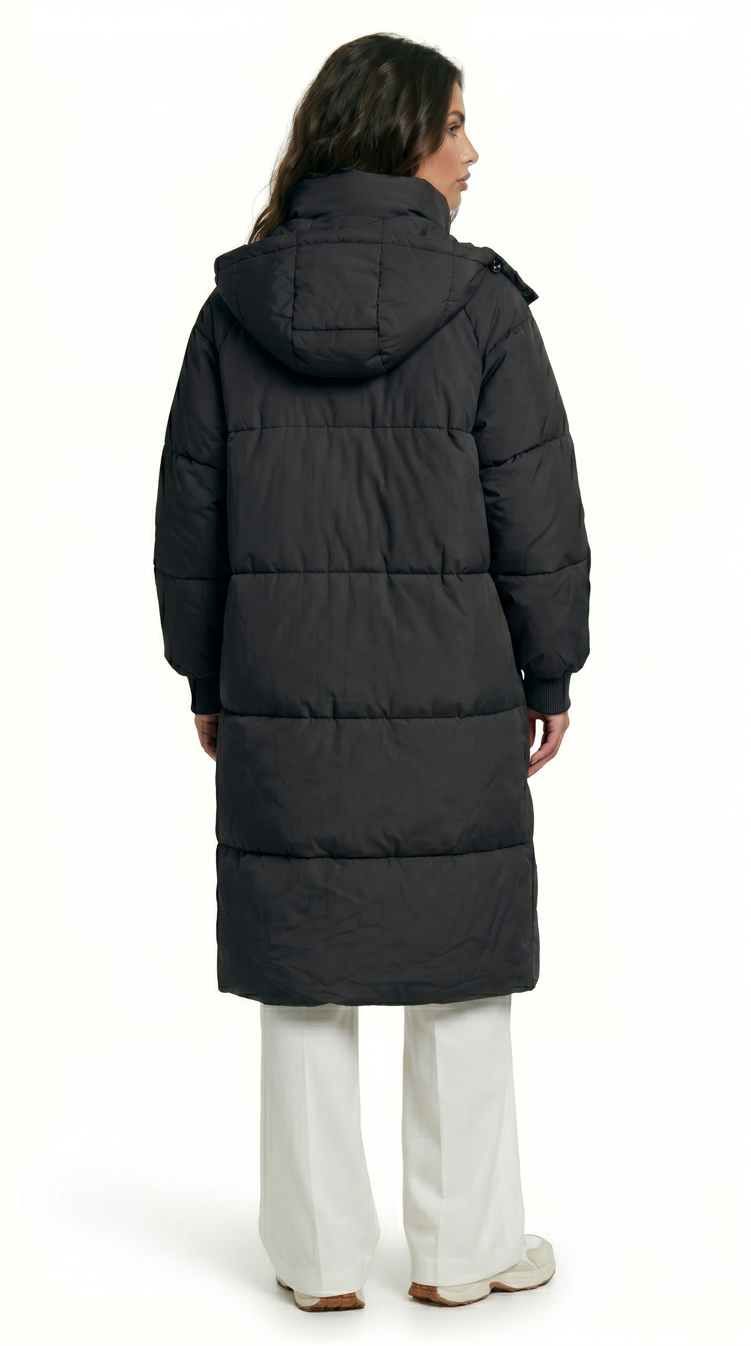 Person wearing a long black puffer coat on a white background from Meleche Fashion USA or Meléche (short as (Mé))