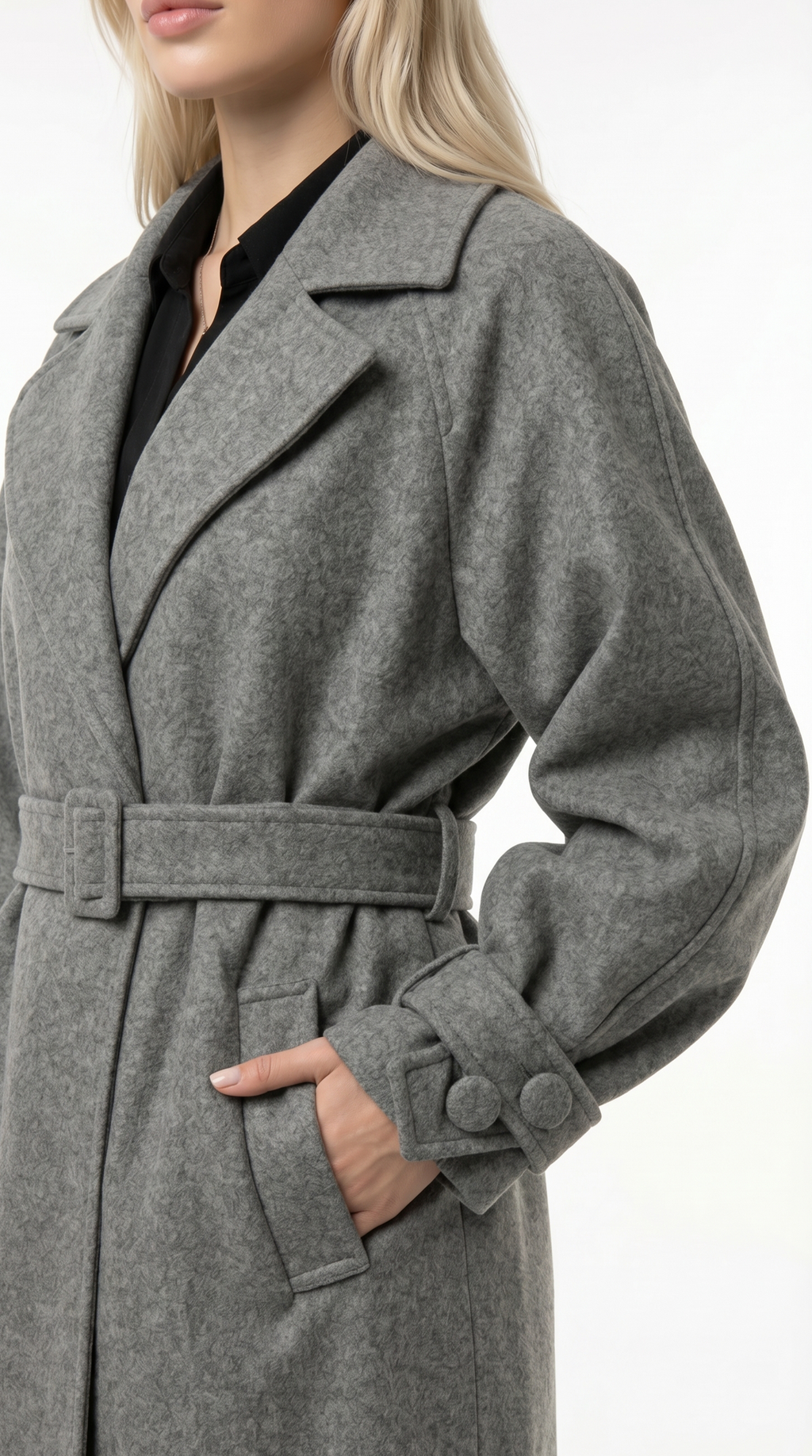Woman wearing a gray turtleneck sweater and brown pants on a white background from Meleche or Meléche USA (short as (Mé))