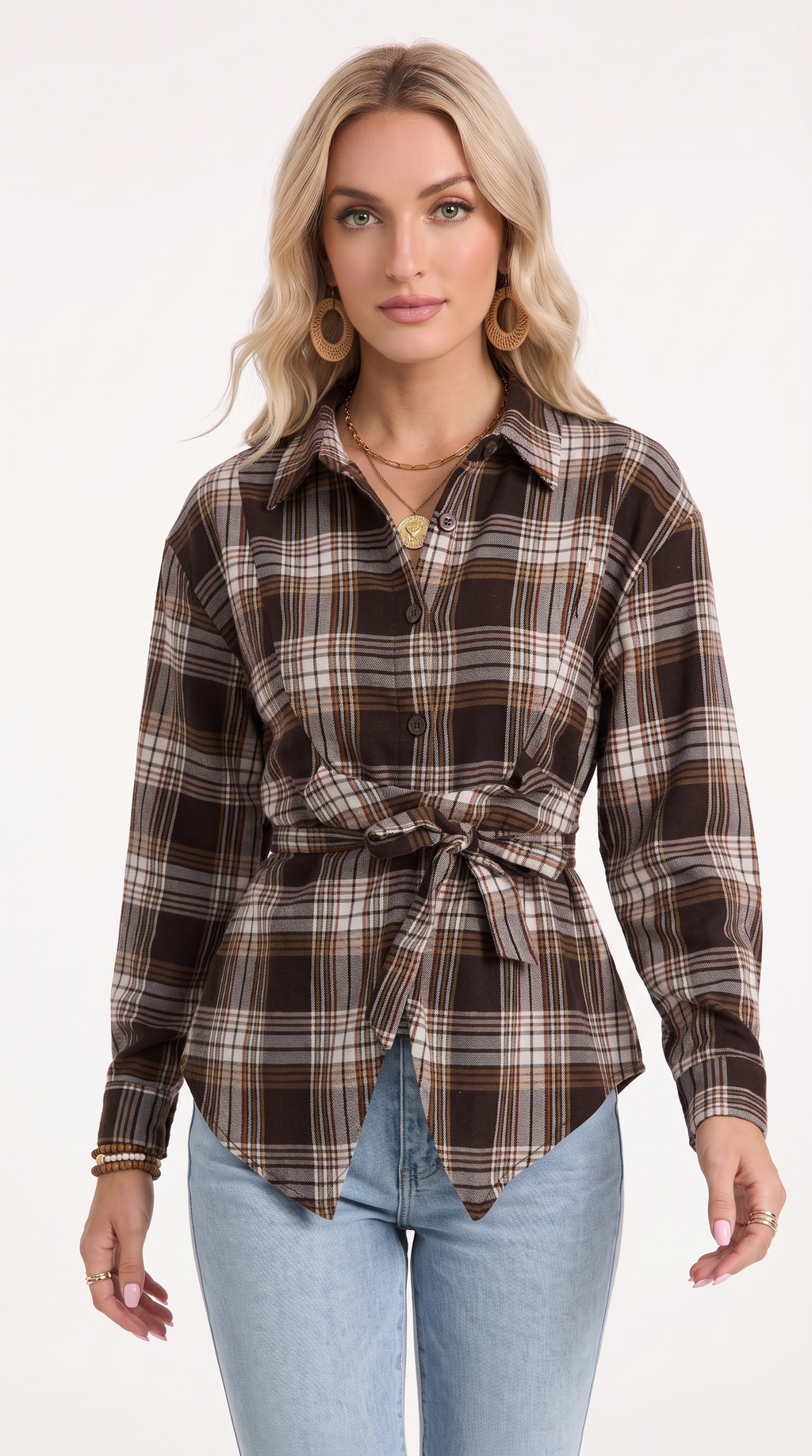 A woman modeling a brown and beige plaid long-sleeve button-up shirt with a tie waist, paired with light blue jeans, against a plain white background, from Meleche Fashion USA or Meléche (short as (Mé))