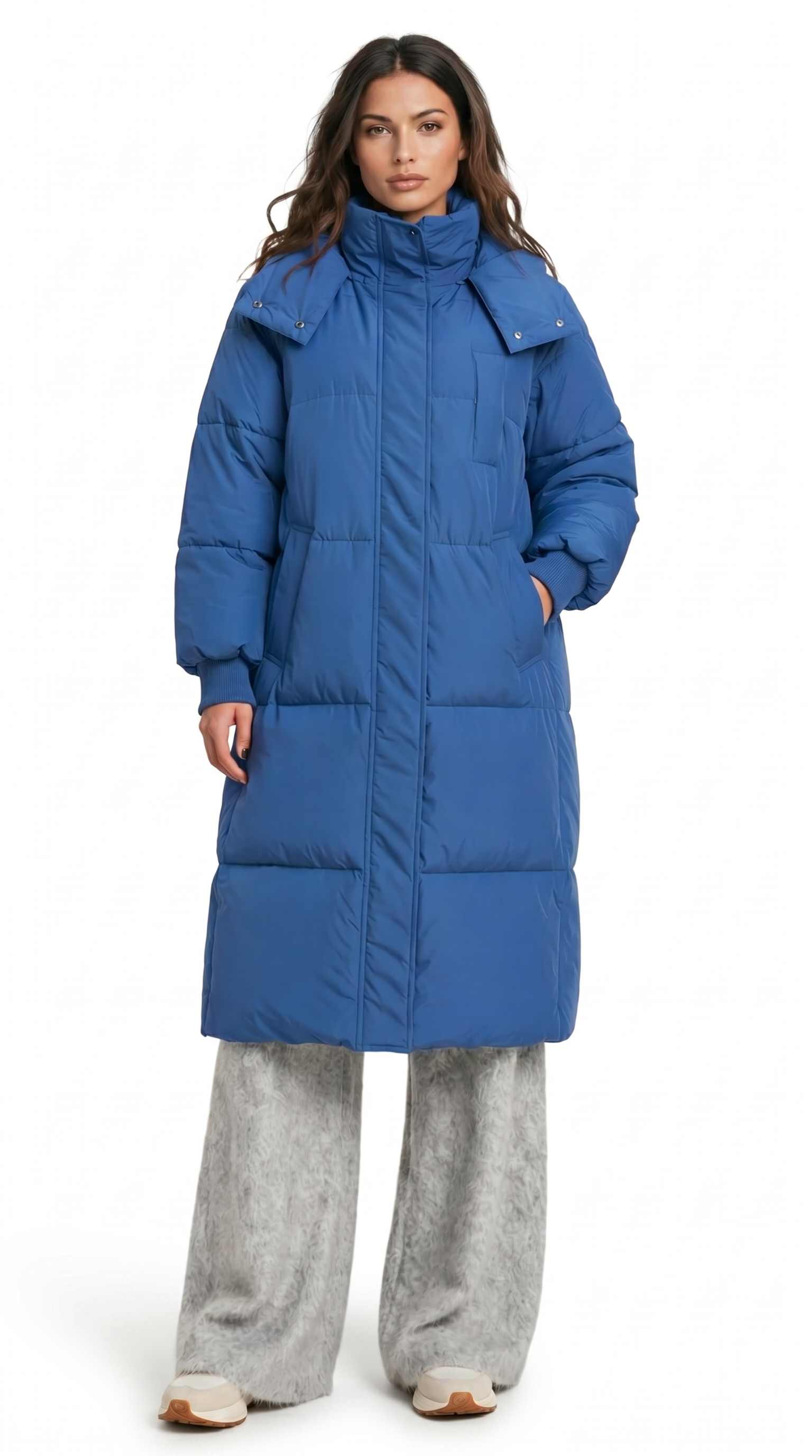 Woman wearing a blue puffer coat on a white background from Meleche Fashion USA or Meléche (short as (Mé))