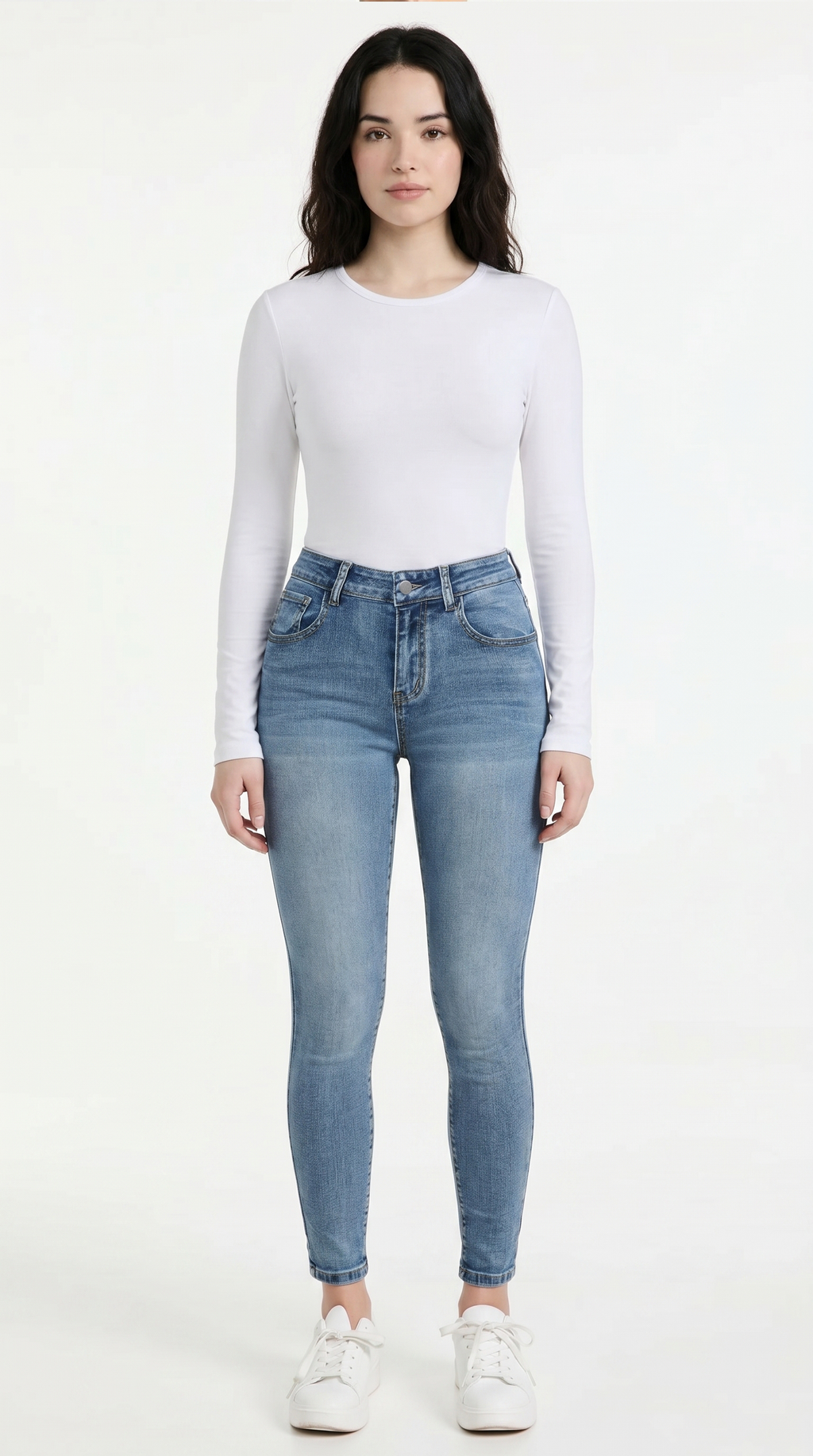 Woman wearing a white long-sleeve top and blue jeans on a white background, High Stretch Sexy Skinny jeans from Meleche Fashion USA or Meléche (short as (Mé))
