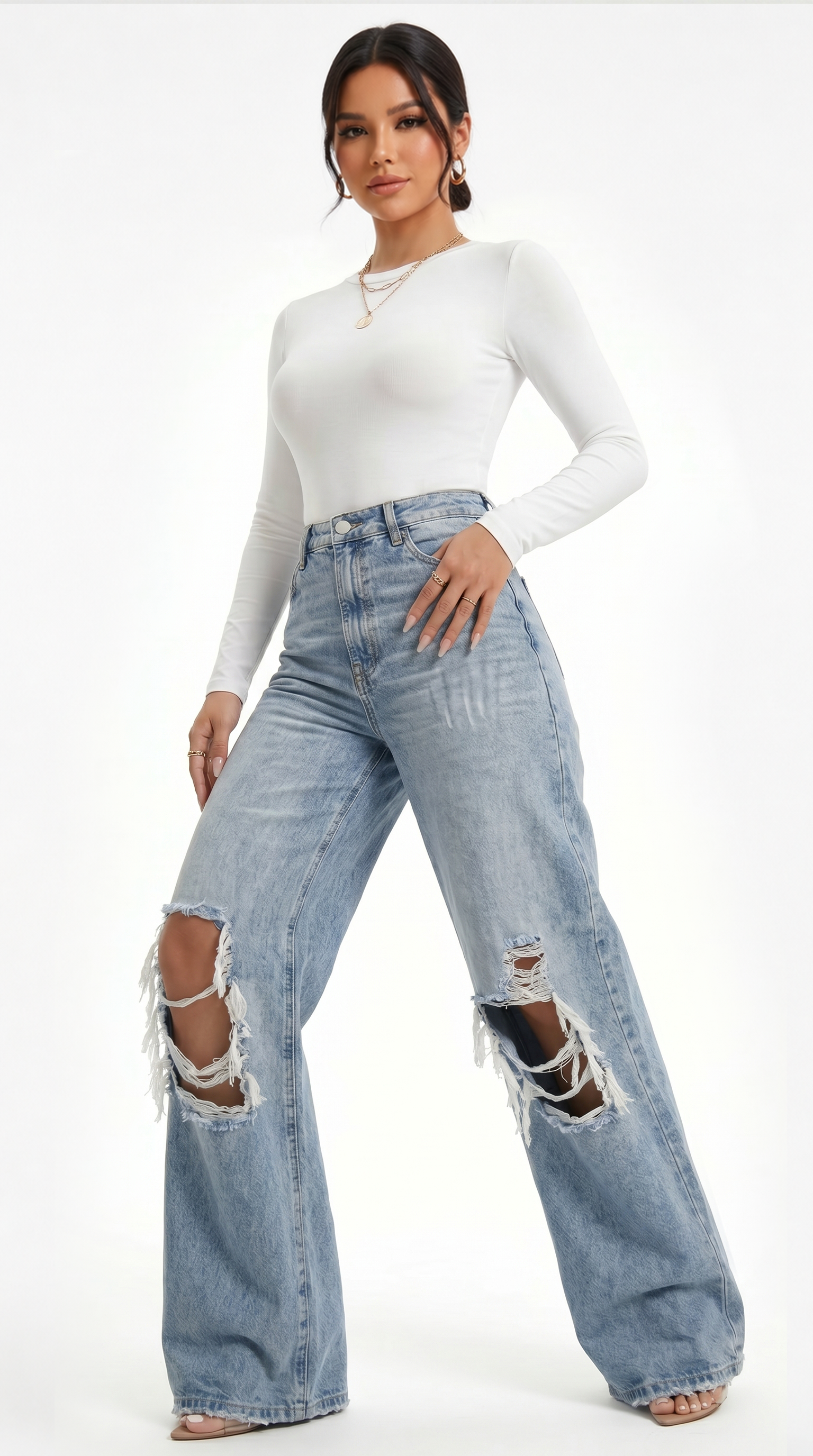 Woman wearing a white long-sleeve top and distressed blue jeans on a white background, Wide-leg jeans from Meleche Fashion USA or Meléche (short as (Mé))