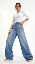 Person wearing a white top and blue jeans on a white background, Wide-leg Egyptian Cotton jeans from Meleche Fashion USA or Meléche (short as (Mé))