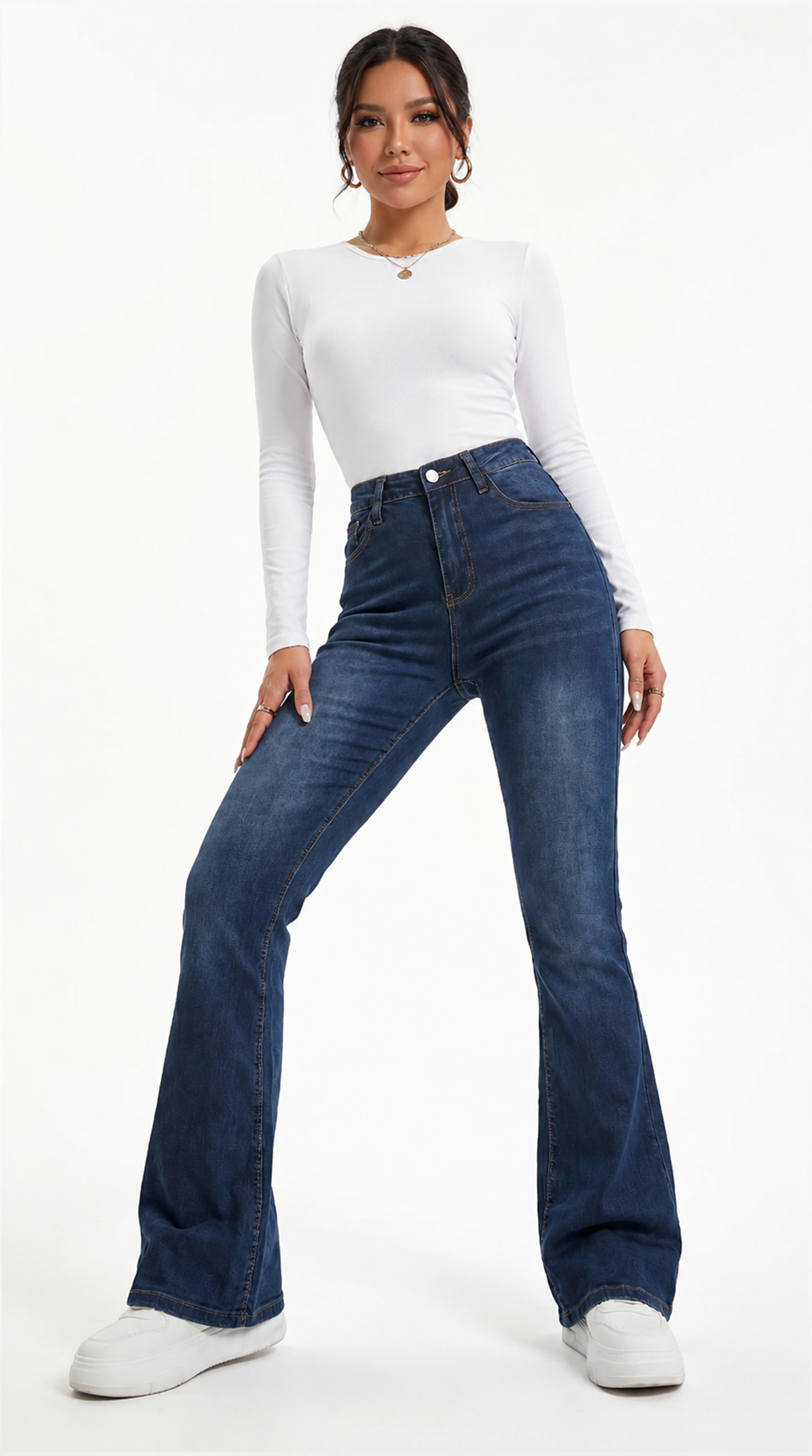 Woman wearing blue jeans and a white top on a white background, Slim flares jeans from Meleche Fashion USA or Meléche (short as (Mé))