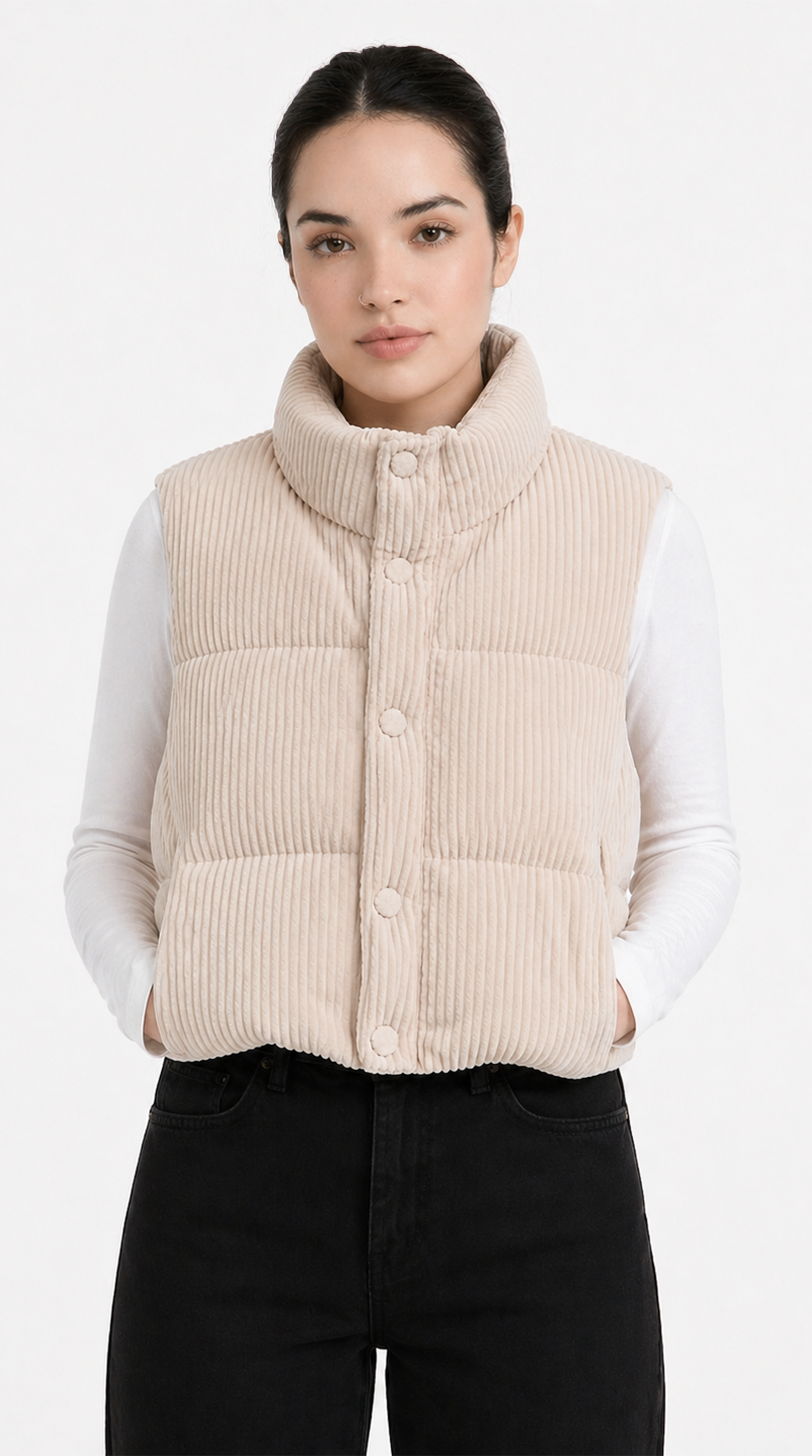 Woman wearing a beige corduroy vest over a white shirt on a white background from Meleche Fashion USA or Meléche (short as (Mé))