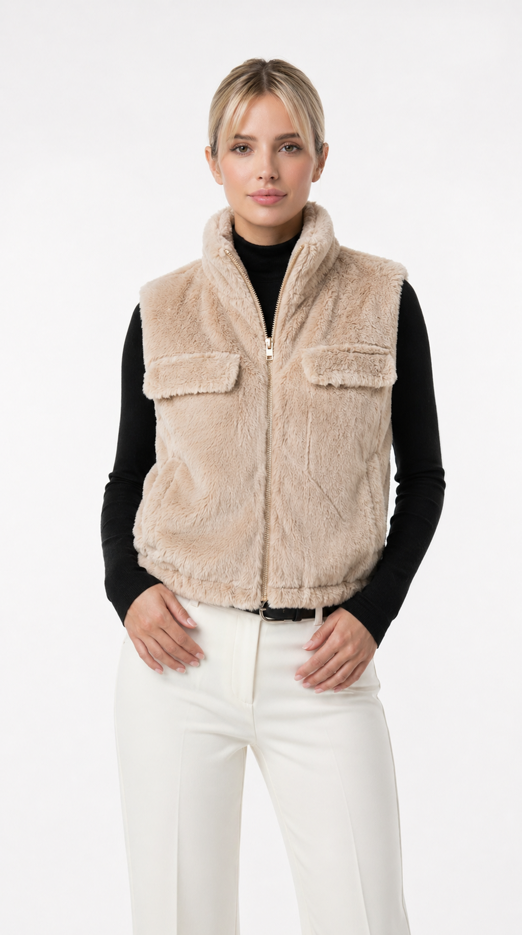 Woman wearing a beige fleece vest over a black shirt on a white background from Meleche Fashion USA or Meléche (short as (Mé))