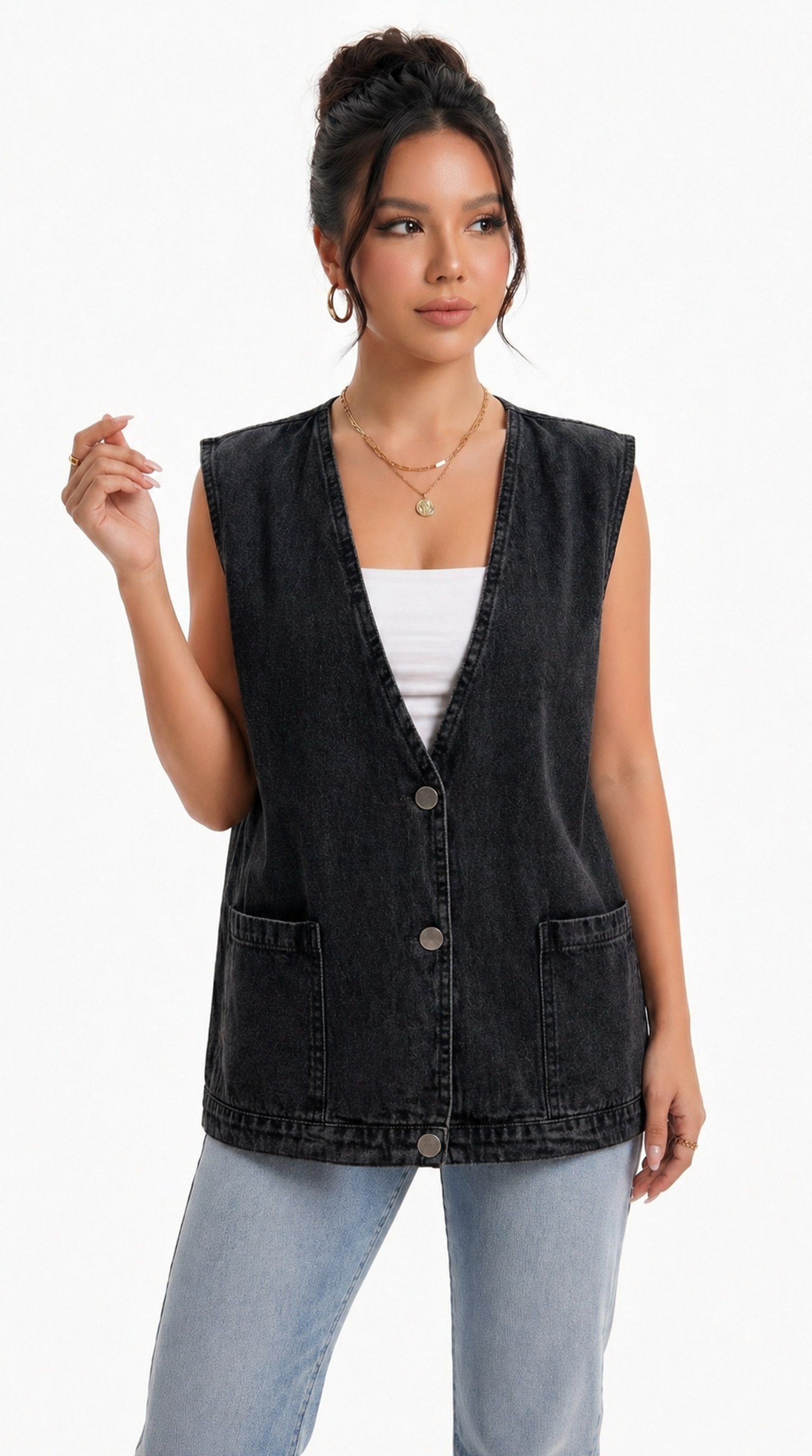 Woman wearing a black denim vest over a white top and light blue jeans on a white background from Meleche Fashion USA or Meléche (short as (Mé))