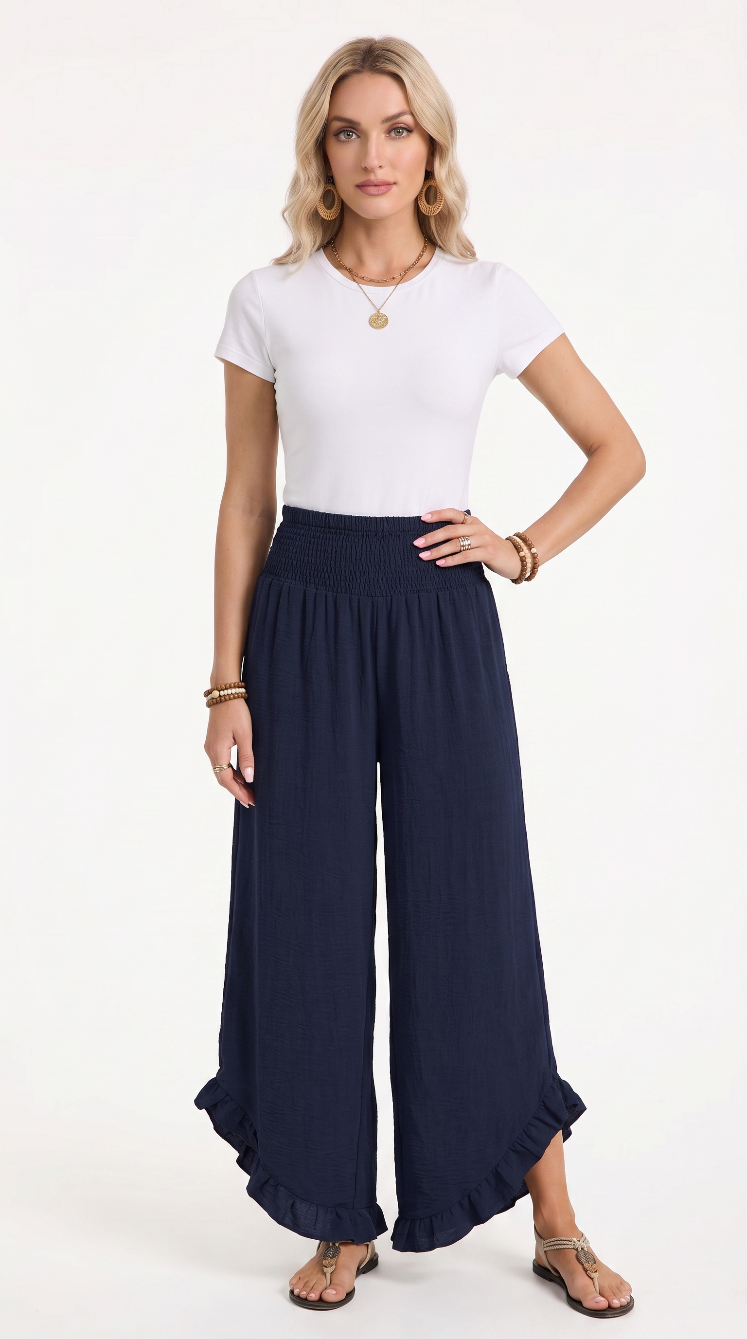 Woman wearing a white top and navy wide-leg pants on a white background, from Meleche Fashion USA or Meléche (short as (Mé))