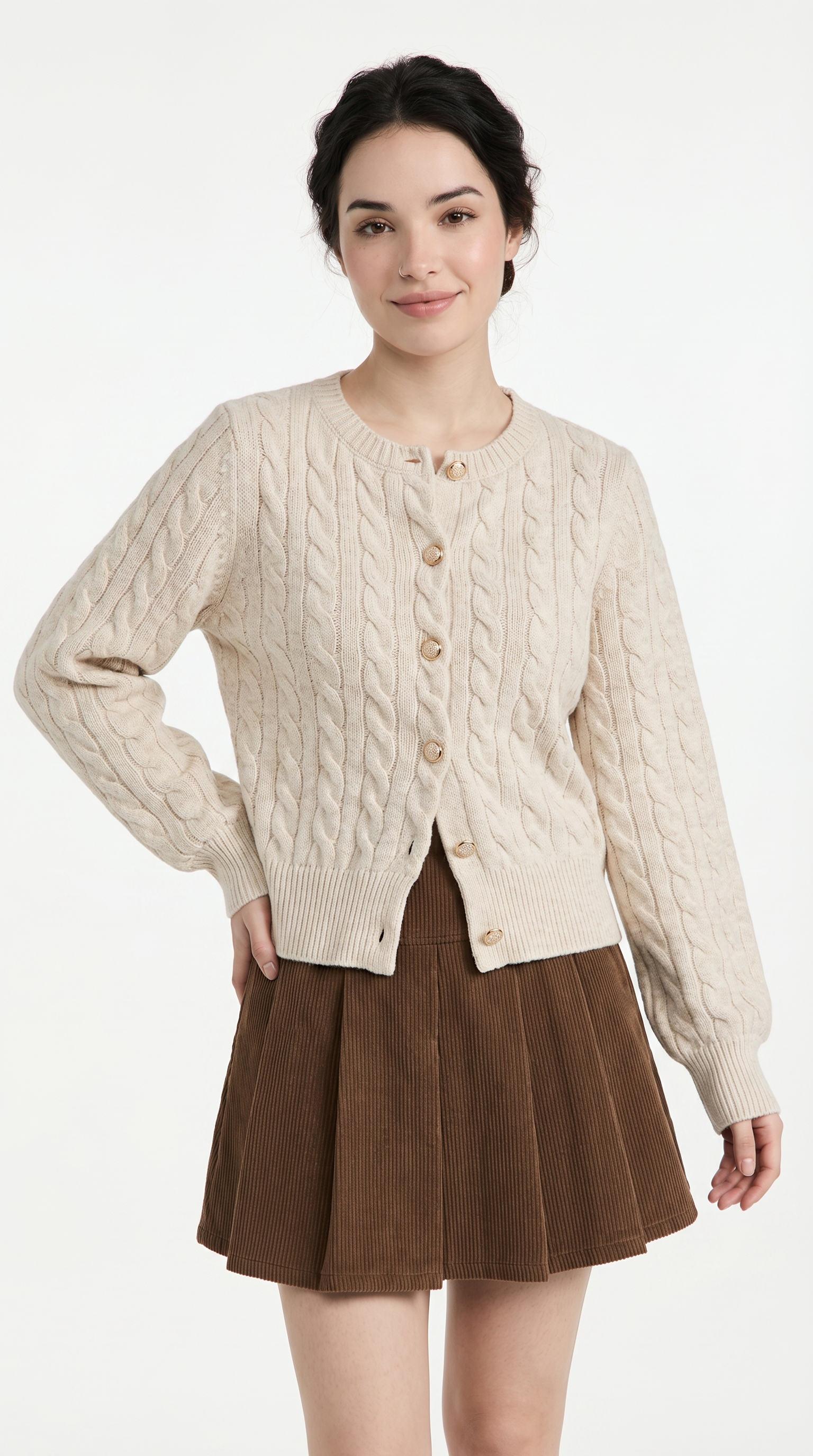 Woman wearing a cream cable knit cardigan over a brown skirt on a white background from Meleche or Meléche (short as (Mé))