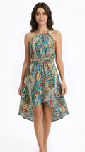 Woman wearing a patterned dress from Meleche or Meléche (short as (Mé))