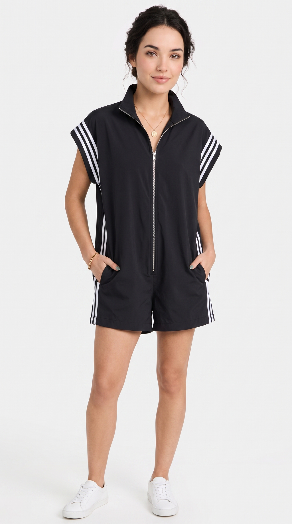 Woman wearing a black sleeveless zip-up romper with white stripes on a white background, from Meleche Fashion USA or Meléche (short as (Mé))