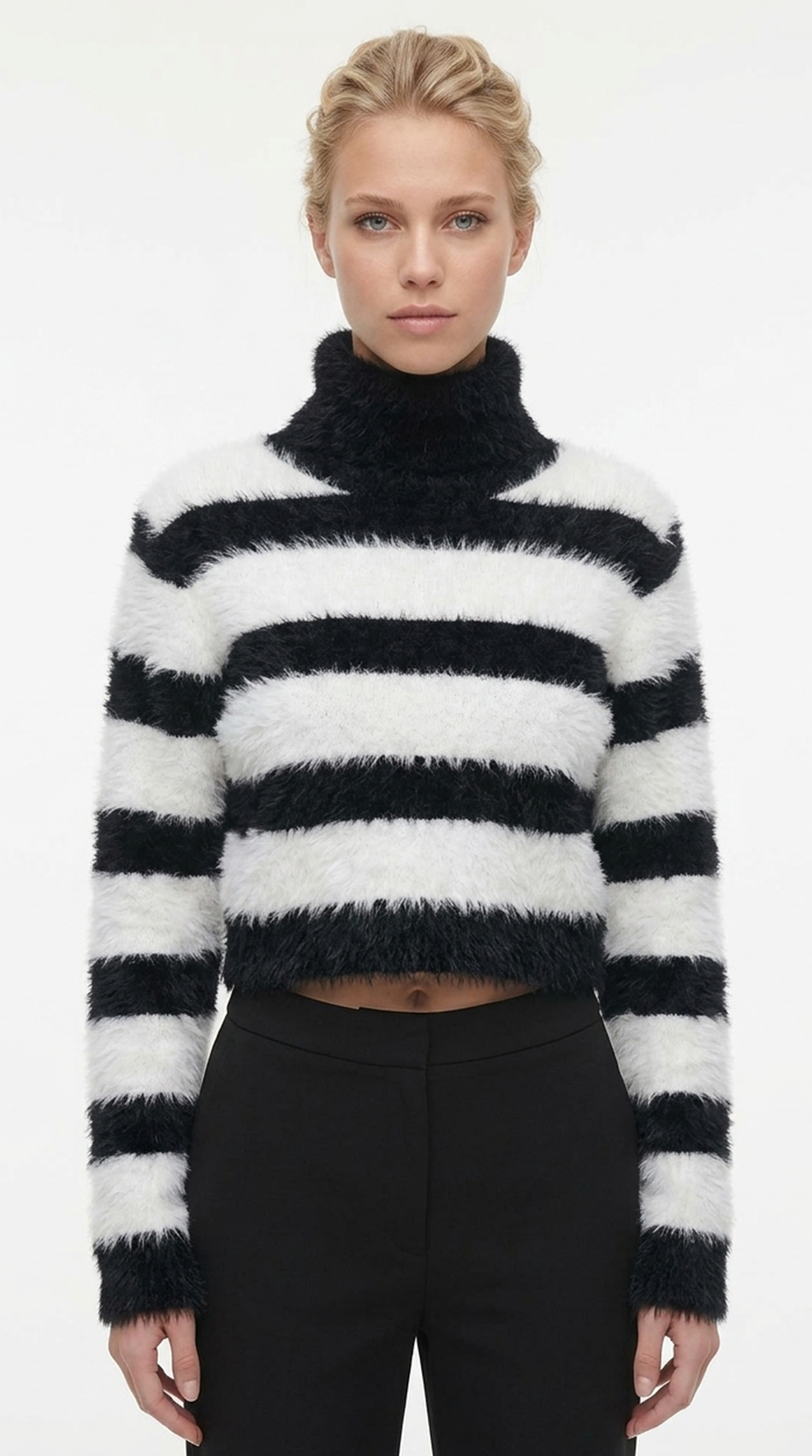 Person wearing a black and white striped sweater against a white background from Meleche or Meléche (short as (Mé))