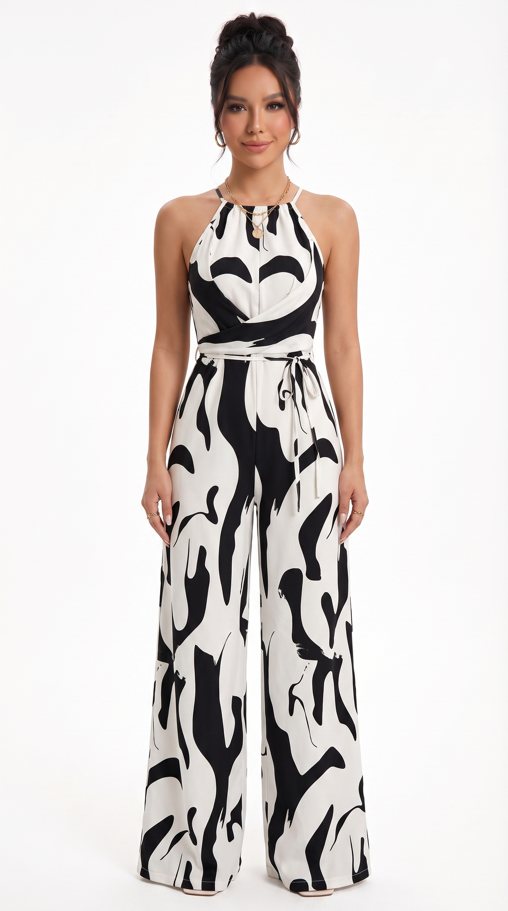 Woman wearing a black and white patterned jumpsuit on a white background, from Meleche Fashion USA or Meléche (short as (Mé))