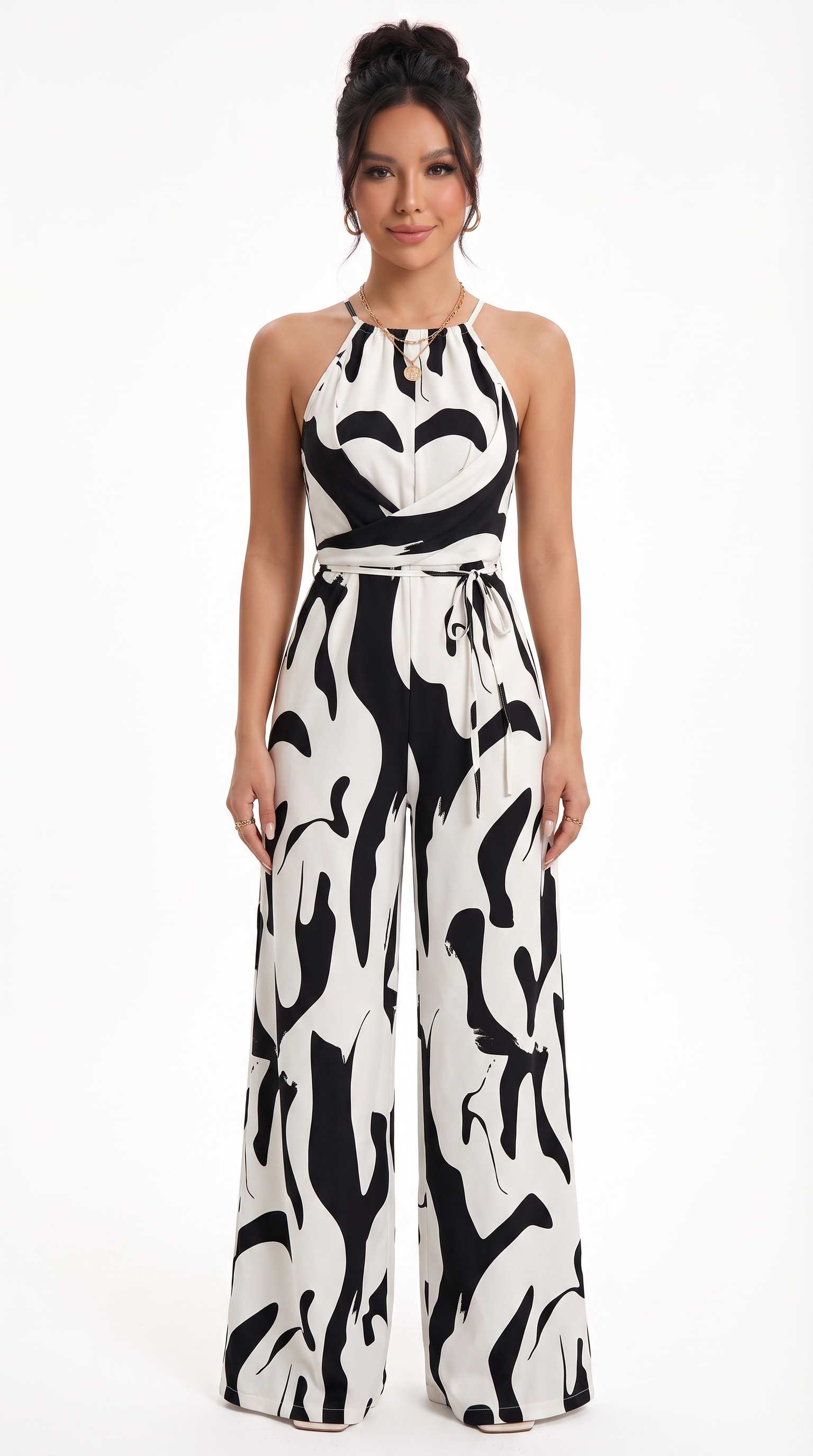 Woman wearing a black and white patterned jumpsuit on a white background, from Meleche Fashion USA or Meléche (short as (Mé))