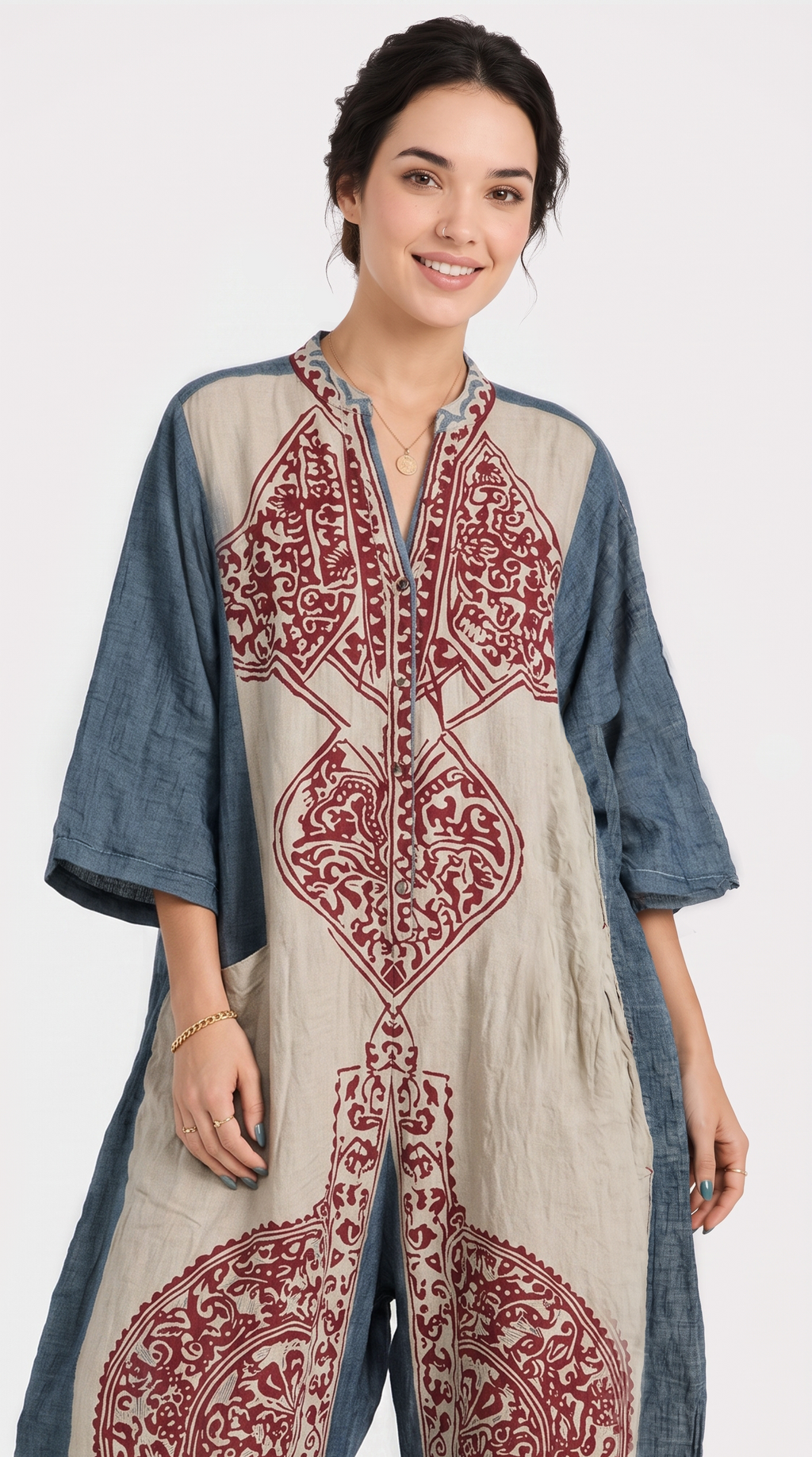 Woman wearing a long, patterned dress with a blue and red design on a white background, from Meleche Fashion USA or Meléche (short as (Mé))