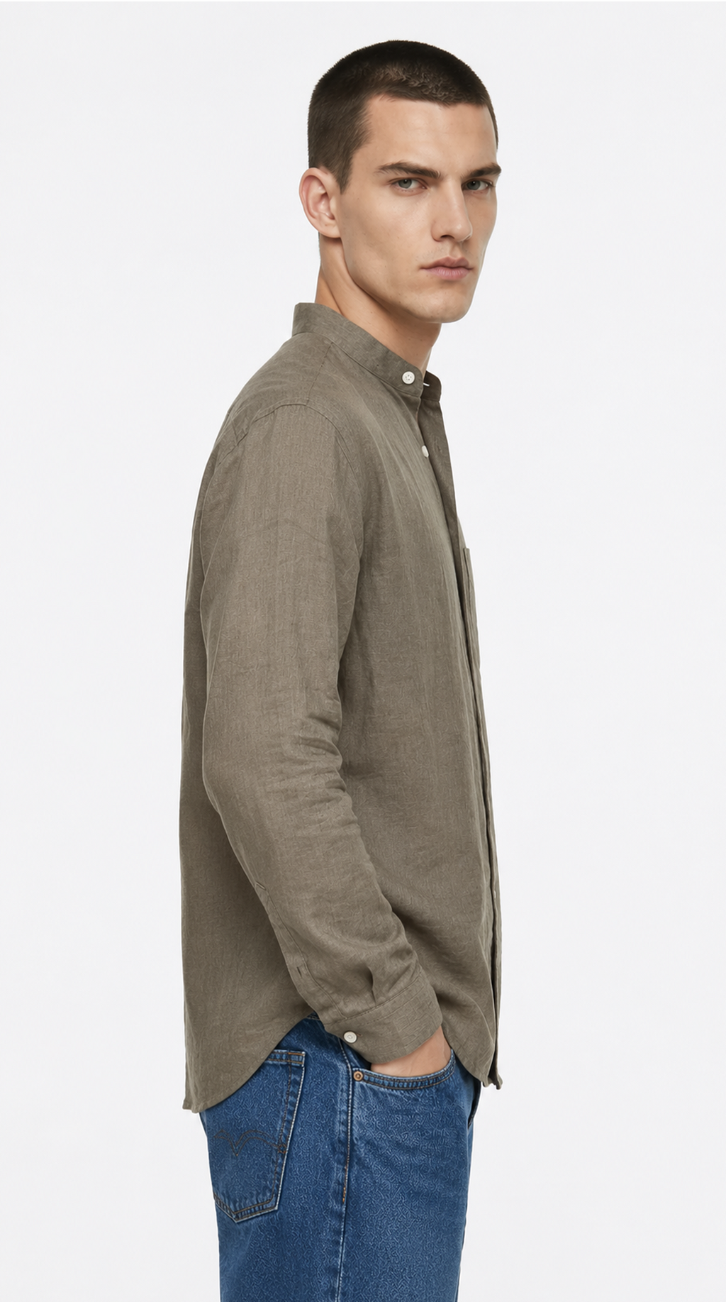 Man wearing a green shirt and blue jeans on a white background, from Meleche Fashion USA or Meléche (short as (Mé))