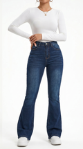 Person wearing blue jeans and a white long-sleeve shirt on a white background, Slim flares jeans from Meleche Fashion USA or Meléche (short as (Mé))