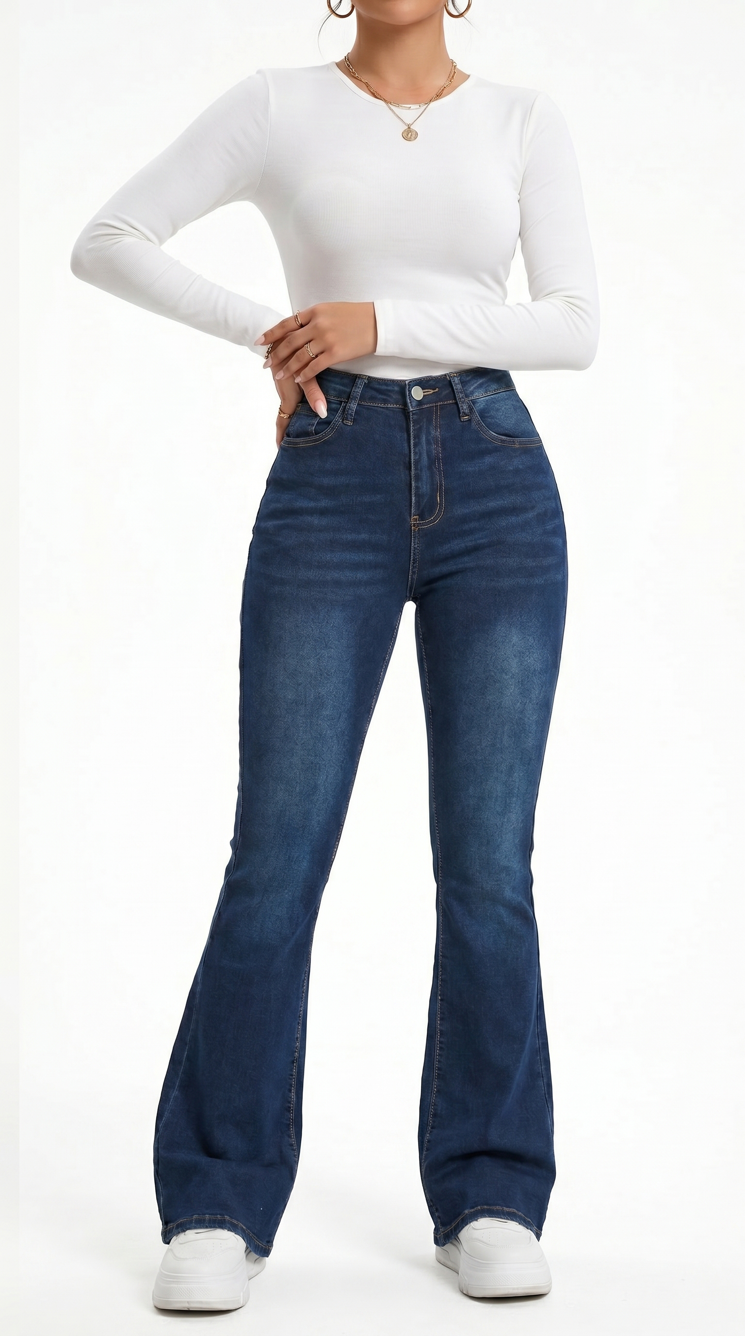 Person wearing blue jeans and a white long-sleeve shirt on a white background, Slim flares jeans from Meleche Fashion USA or Meléche (short as (Mé))