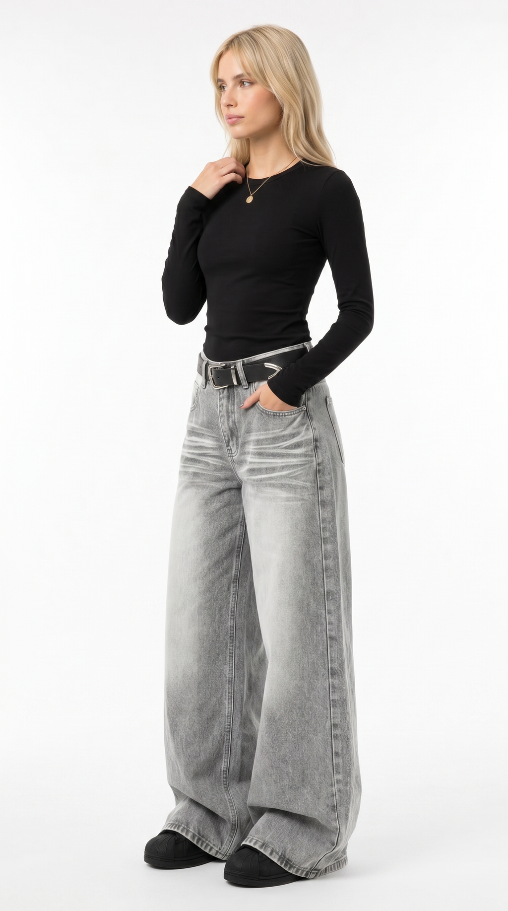 Woman wearing a black long-sleeve top and gray wide-leg jeans on a white background jeans from Meleche Fashion USA or Meléche (short as (Mé))