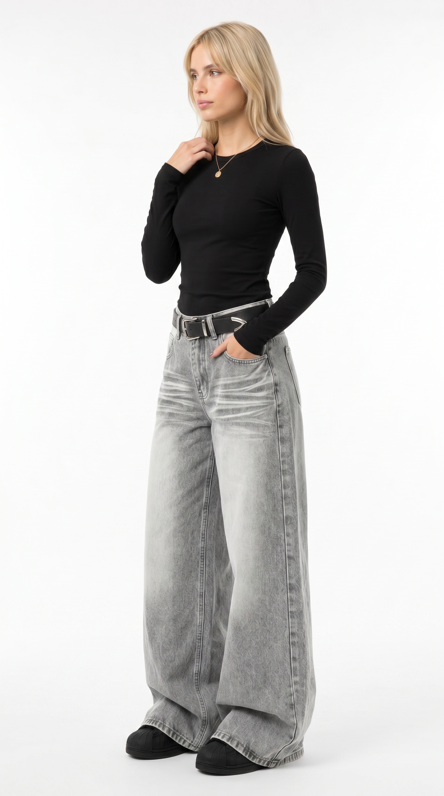 Woman wearing a black long-sleeve top and gray wide-leg jeans on a white background jeans from Meleche Fashion USA or Meléche (short as (Mé))