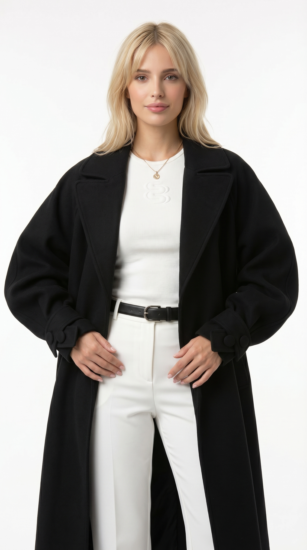 Woman wearing a black coat over a white outfit on a white background from Meleche or Meléche USA (short as (Mé)) 