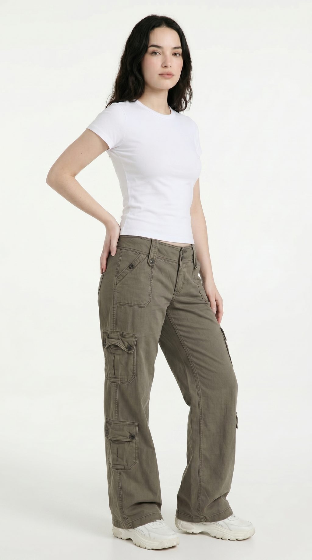 Woman wearing olive green cargo pants and a white t-shirt on a white background, from Meleche Fashion USA or Meléche (short as (Mé))