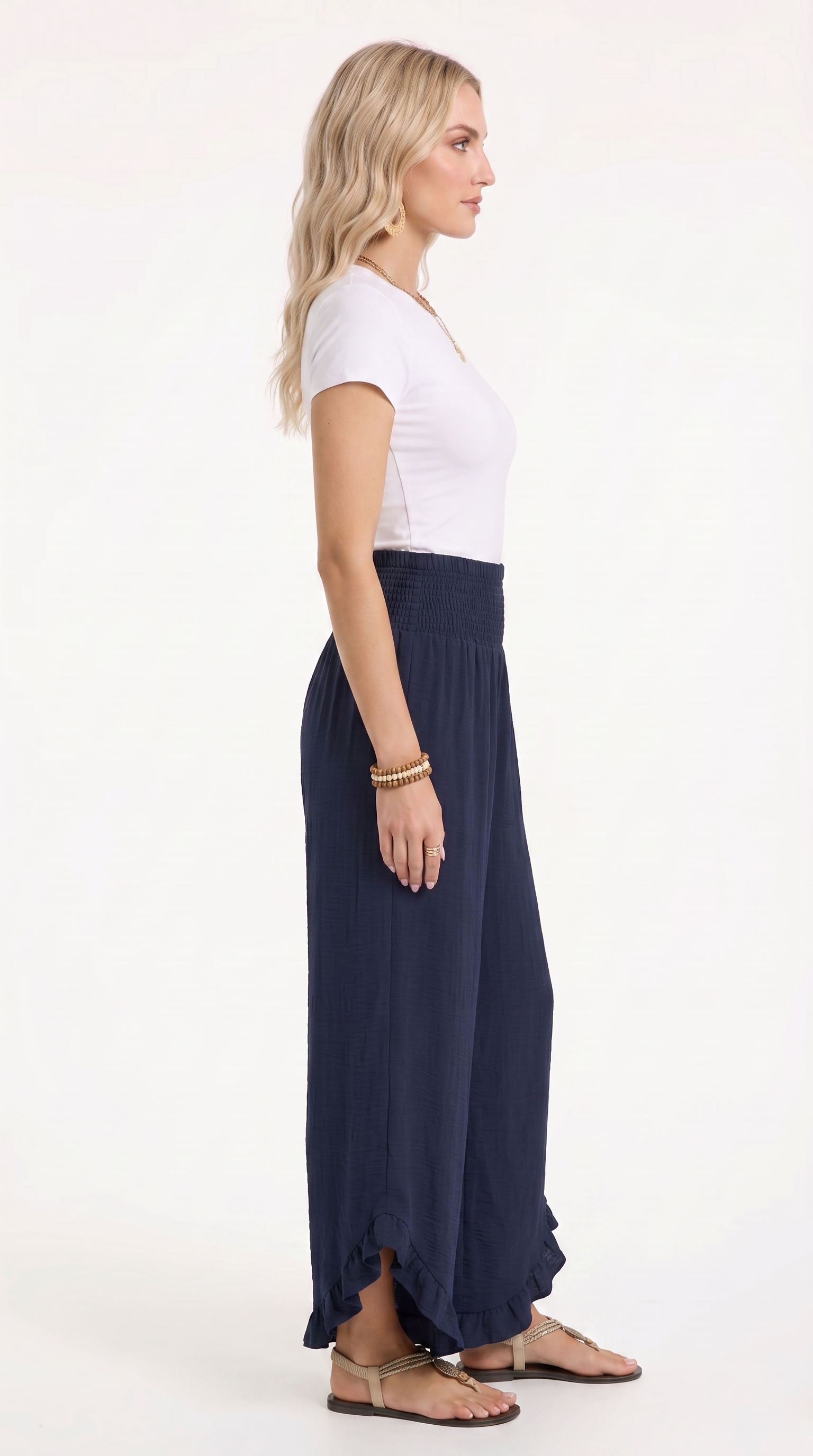 Woman wearing a white top and navy blue skirt on a white background, from Meleche Fashion USA or Meléche (short as (Mé))