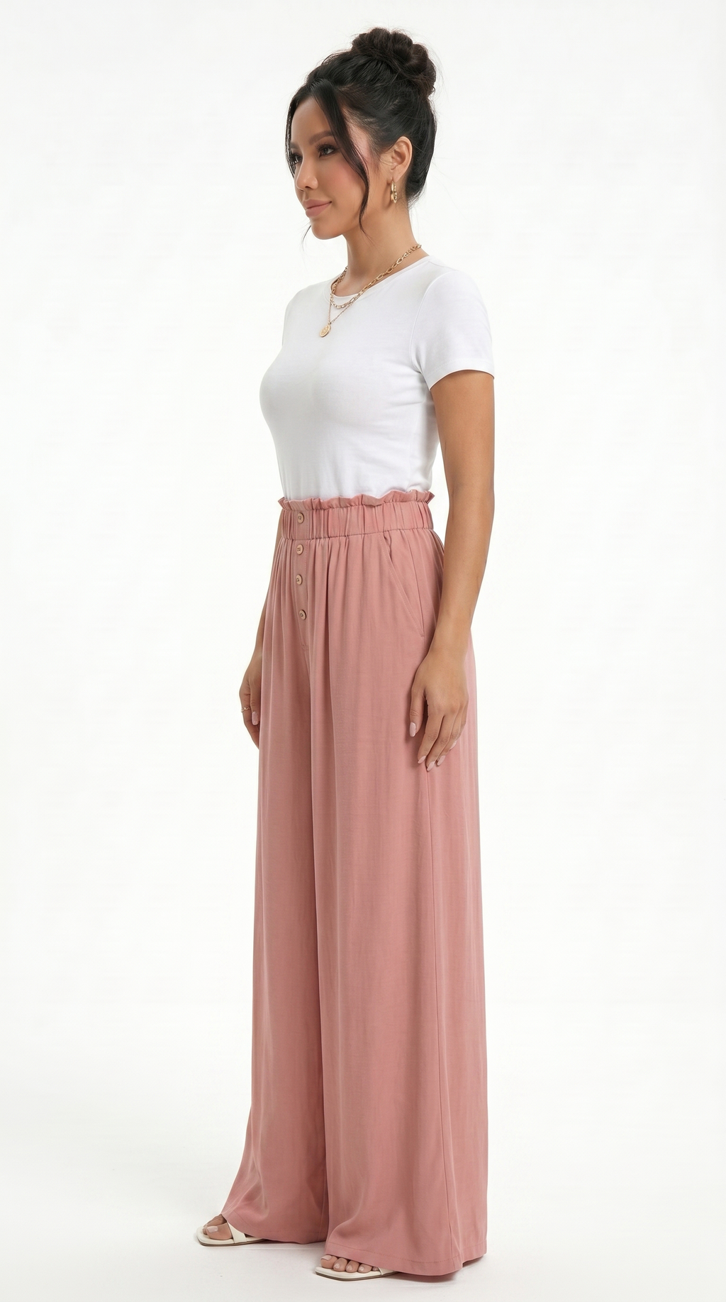 Woman wearing a white top and pink wide-leg pants on a white background, sexy loss pants from Meleche Fashion USA or Meléche (short as (Mé))