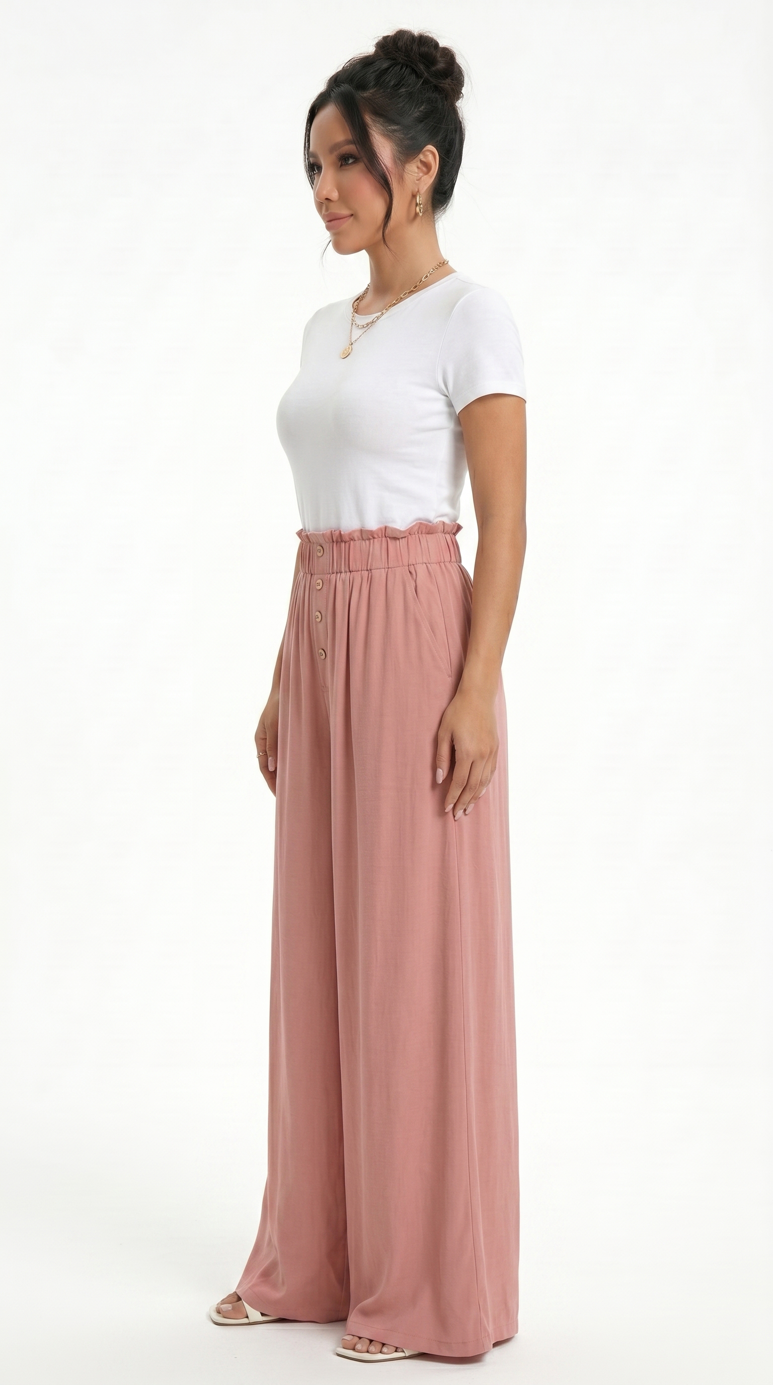 Woman wearing a white top and pink wide-leg pants on a white background, sexy loss pants from Meleche Fashion USA or Meléche (short as (Mé))
