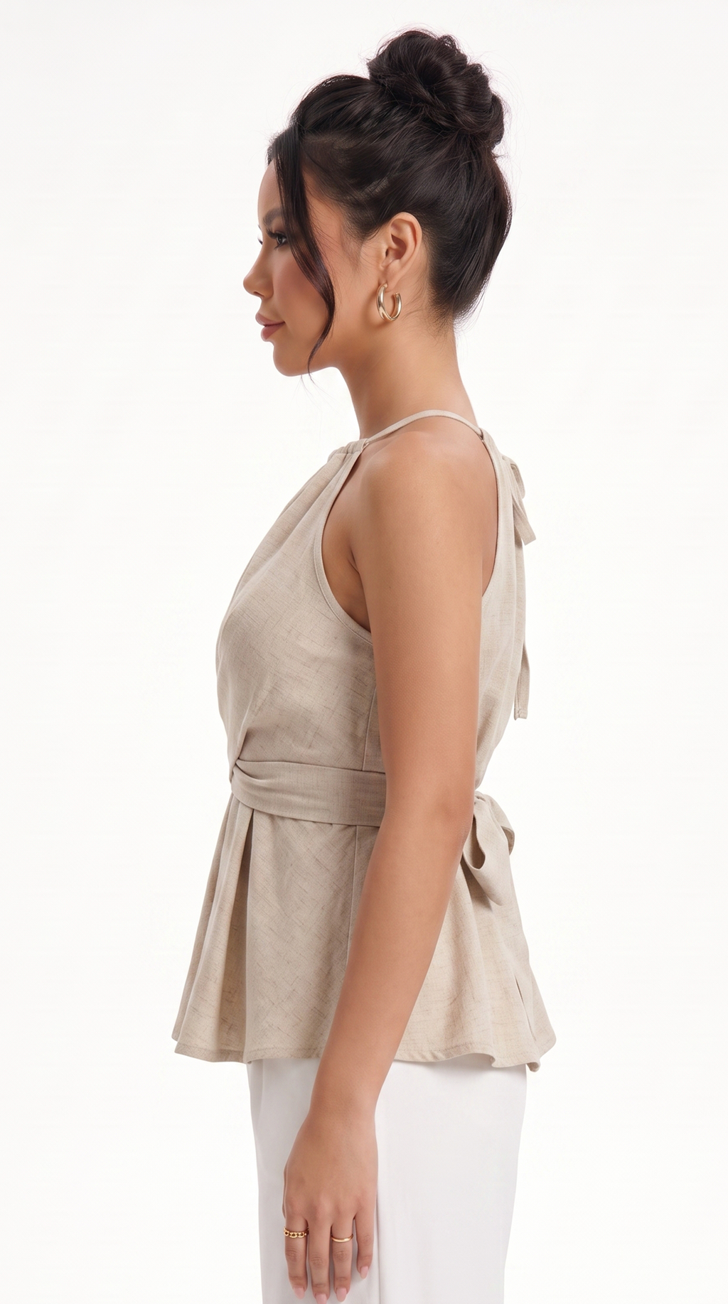 girl wearing Beige halter top with a tied front on a white background, from Meleche Fashion USA or Meléche (short as (Mé))