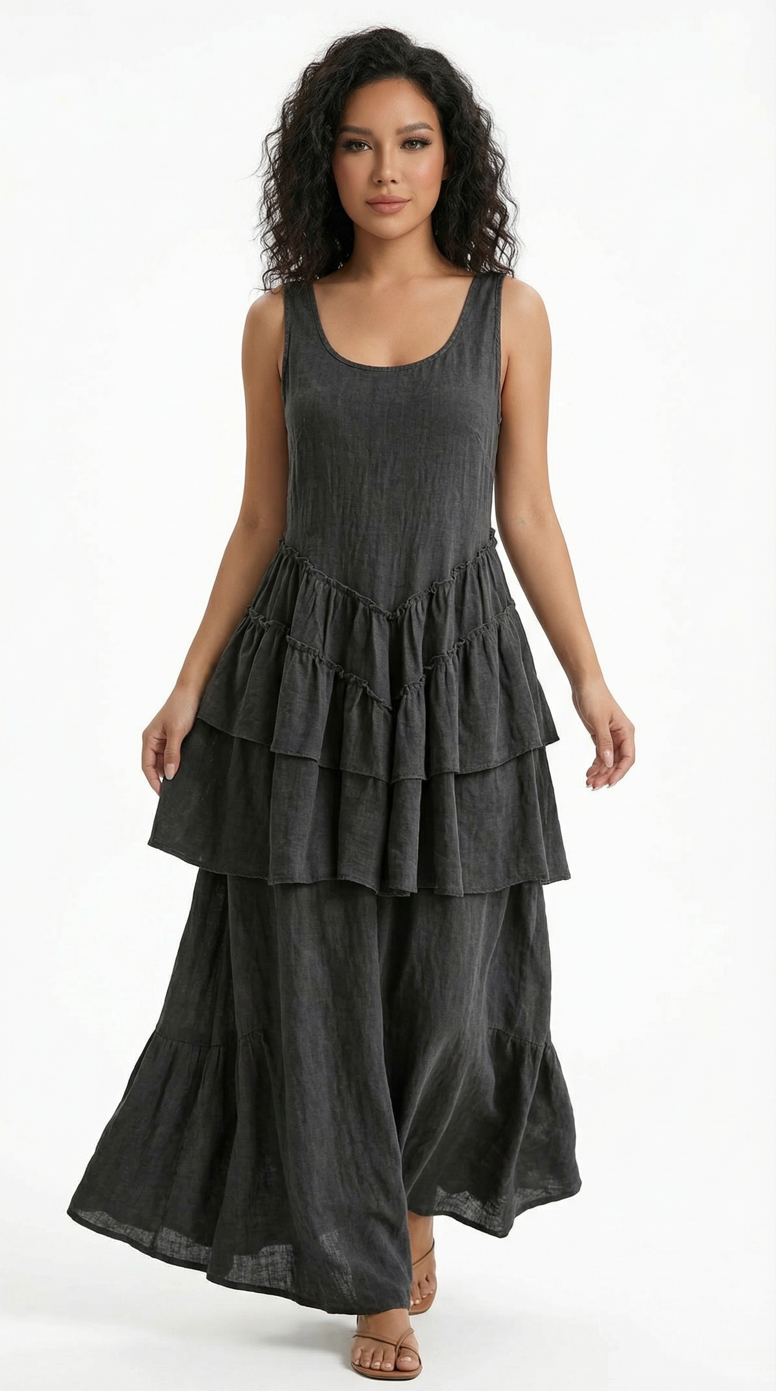 Woman wearing a navy blue dress with a white background