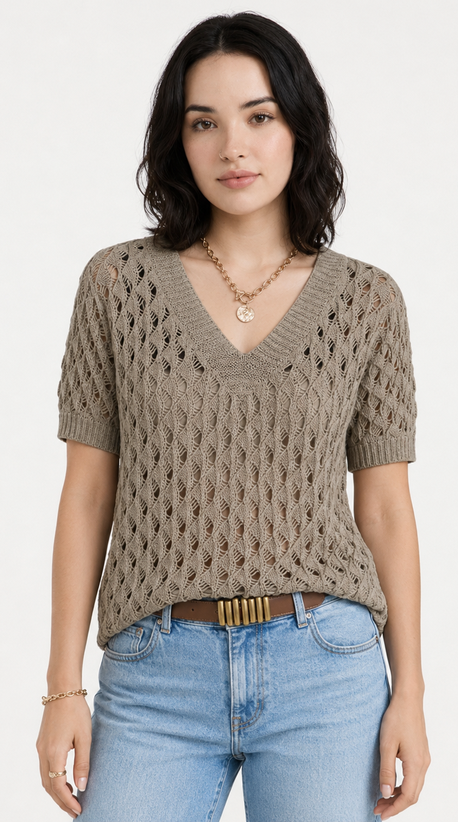 Woman wearing a brown knitted sweater and blue jeans on a white background, from Meleche Fashion USA or Meléche (short as (Mé))
