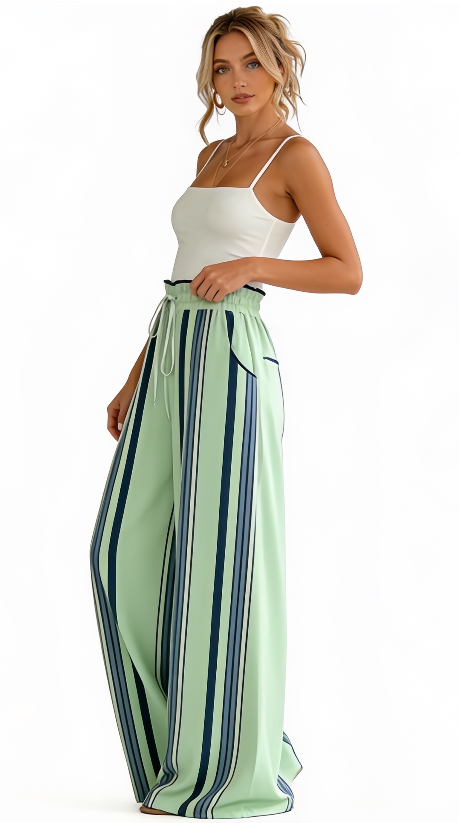 Woman wearing a white top and green striped pants on a white background