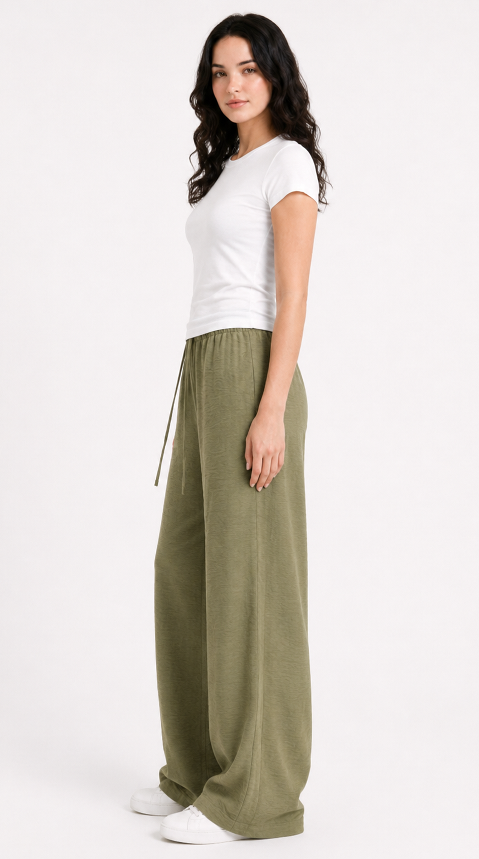 Woman wearing a white t-shirt and olive green wide-leg pants on a white background, from Meleche Fashion USA or Meléche (short as (Mé))