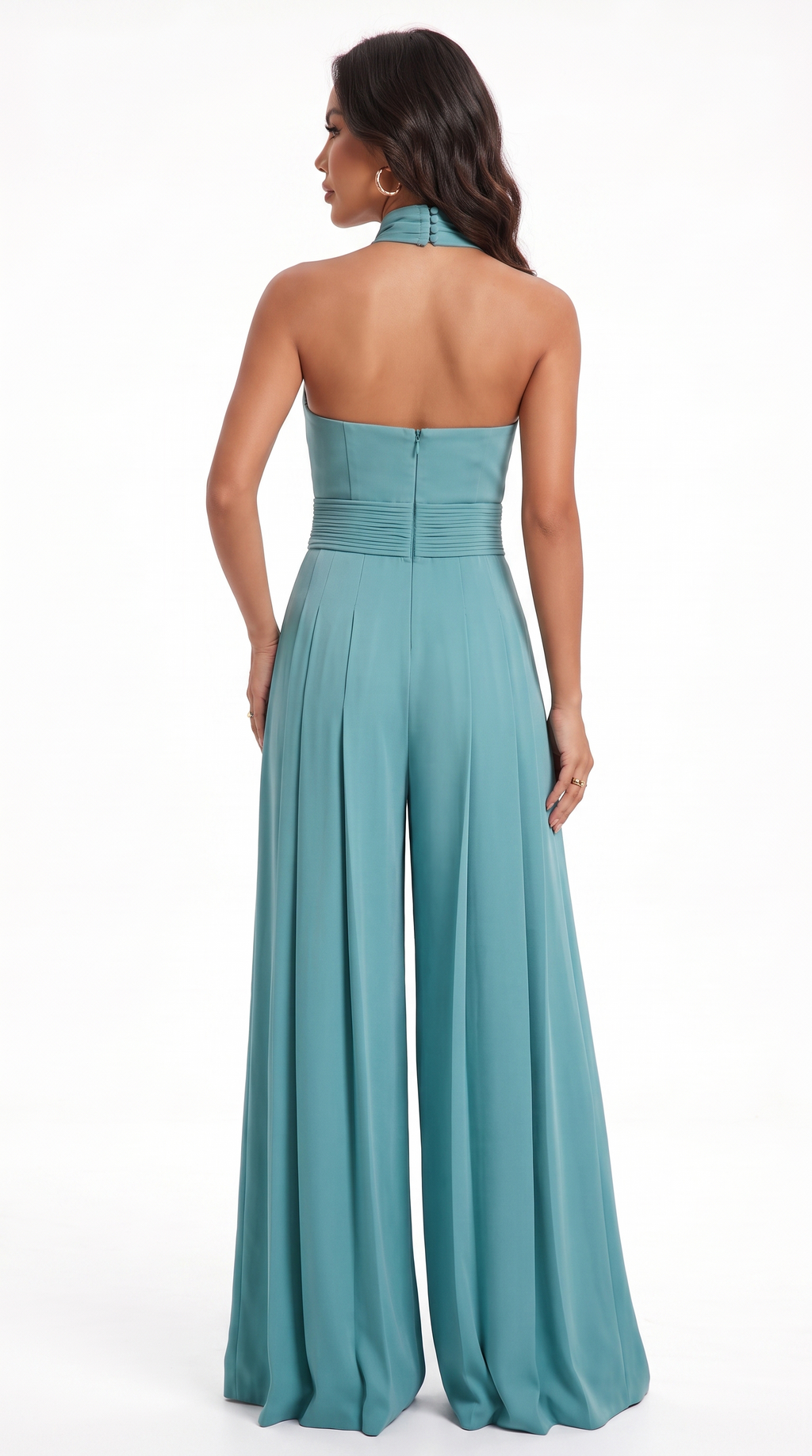 A woman modeling a teal halter-neck wide-leg jumpsuit from the back, shown against a plain white studio background, from Meleche Fashion USA or Meléche (short as (Mé))