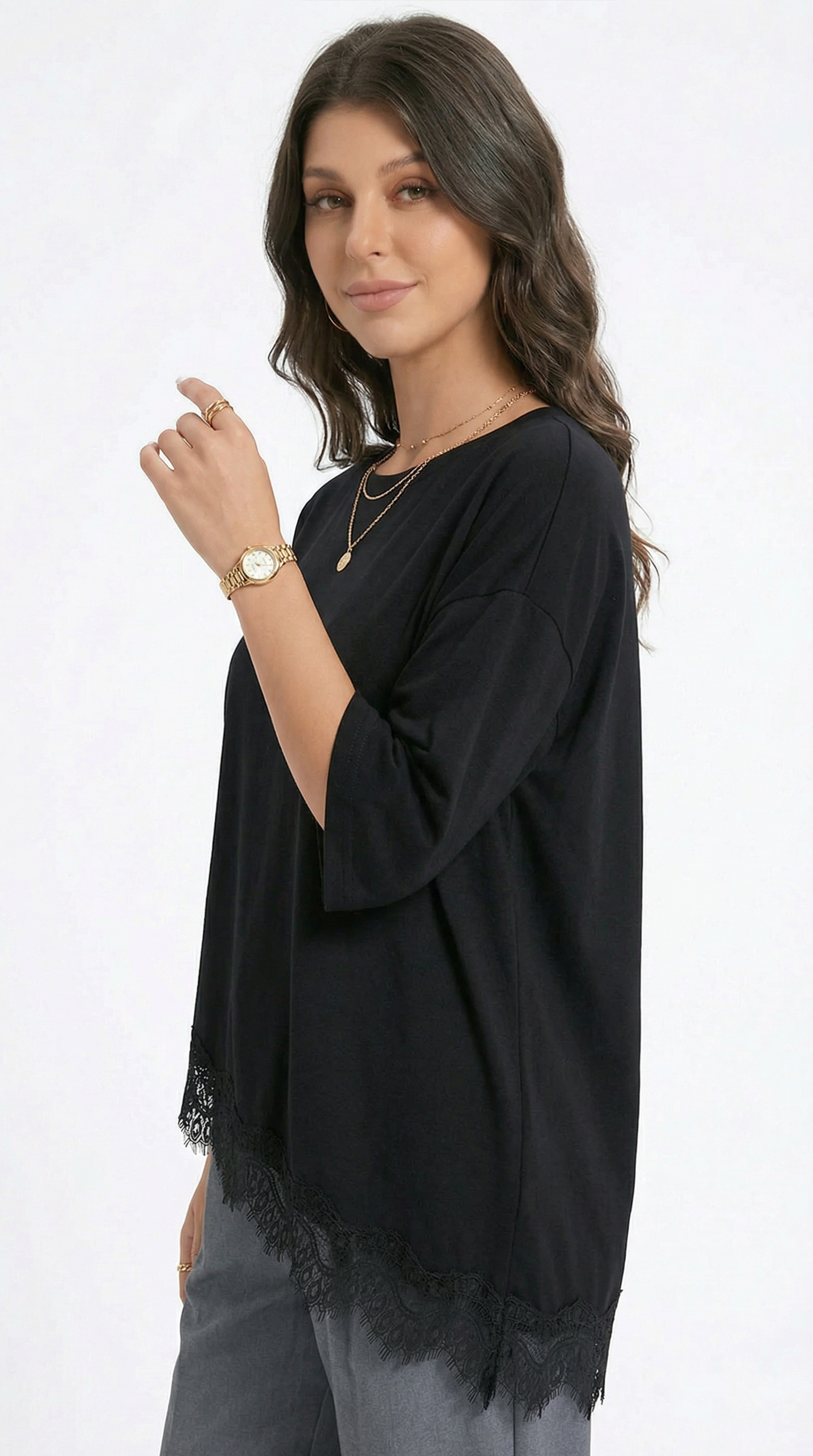 Woman wearing a black long-sleeve top with lace detailing on a white background, from Meleche Fashion USA or Meléche (short as (Mé))