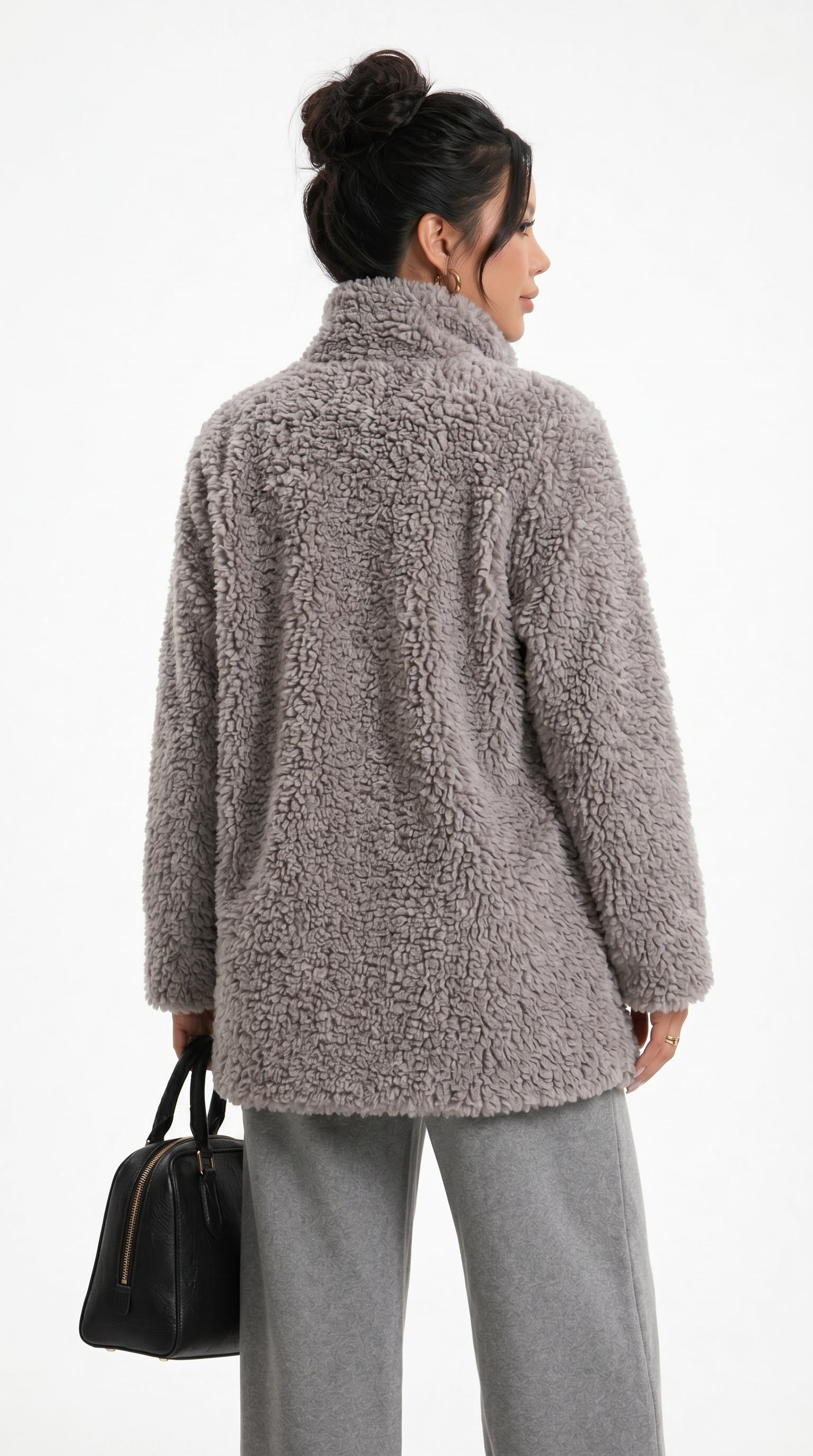 Woman wearing a brown teddy coat on a white background from Meleche Fashion USA or Meléche (short as (Mé))