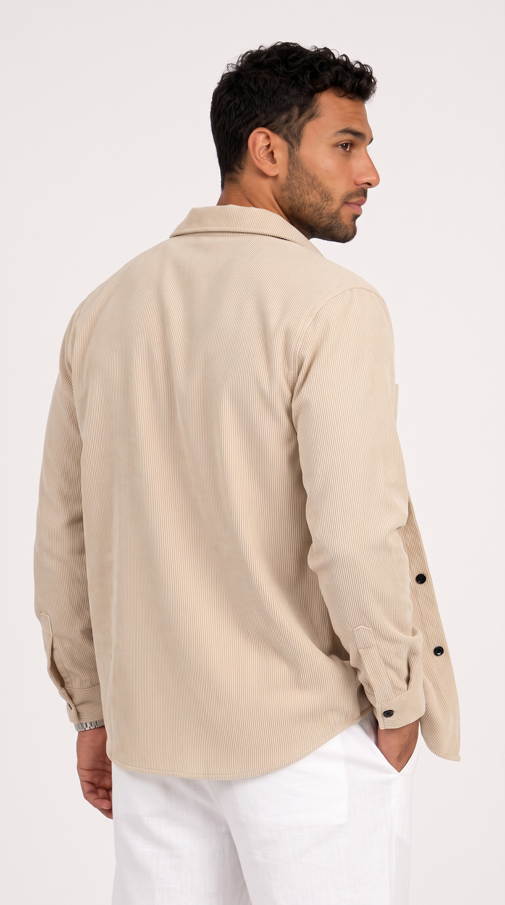 A man wearing a light beige long-sleeve button-up shirt and white trousers, shown from a three-quarters back view against a plain white studio background, from Meleche Fashion USA or Meléche (short as (Mé))