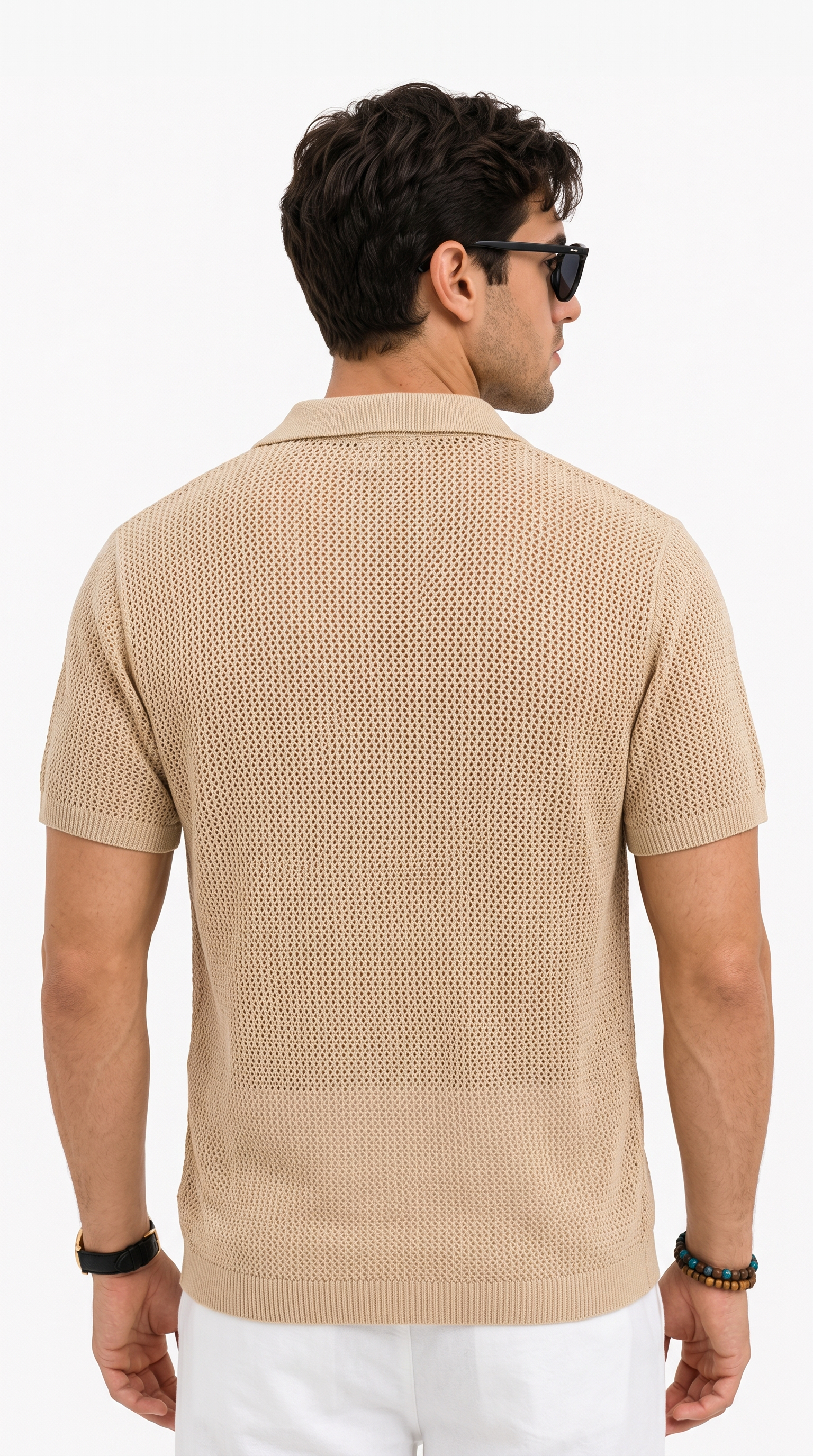A man shown from the back wearing a beige short-sleeve knit polo shirt and white pants against a plain white studio background, from Meleche Fashion USA or Meléche (short as (Mé))