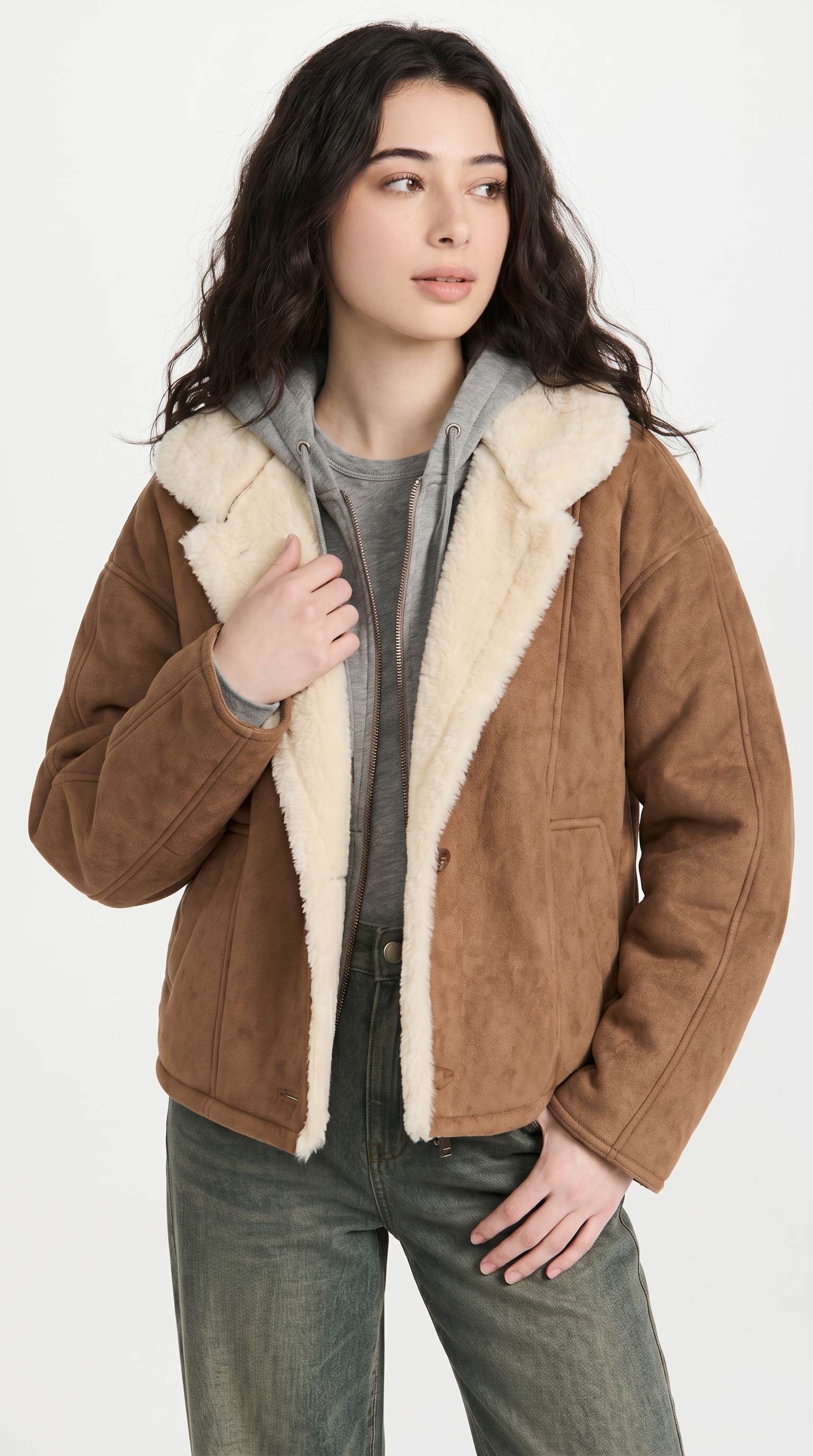 Woman wearing a brown jacket with white fur lining on a white background from Meleche or Meléche USA (short as (Mé))