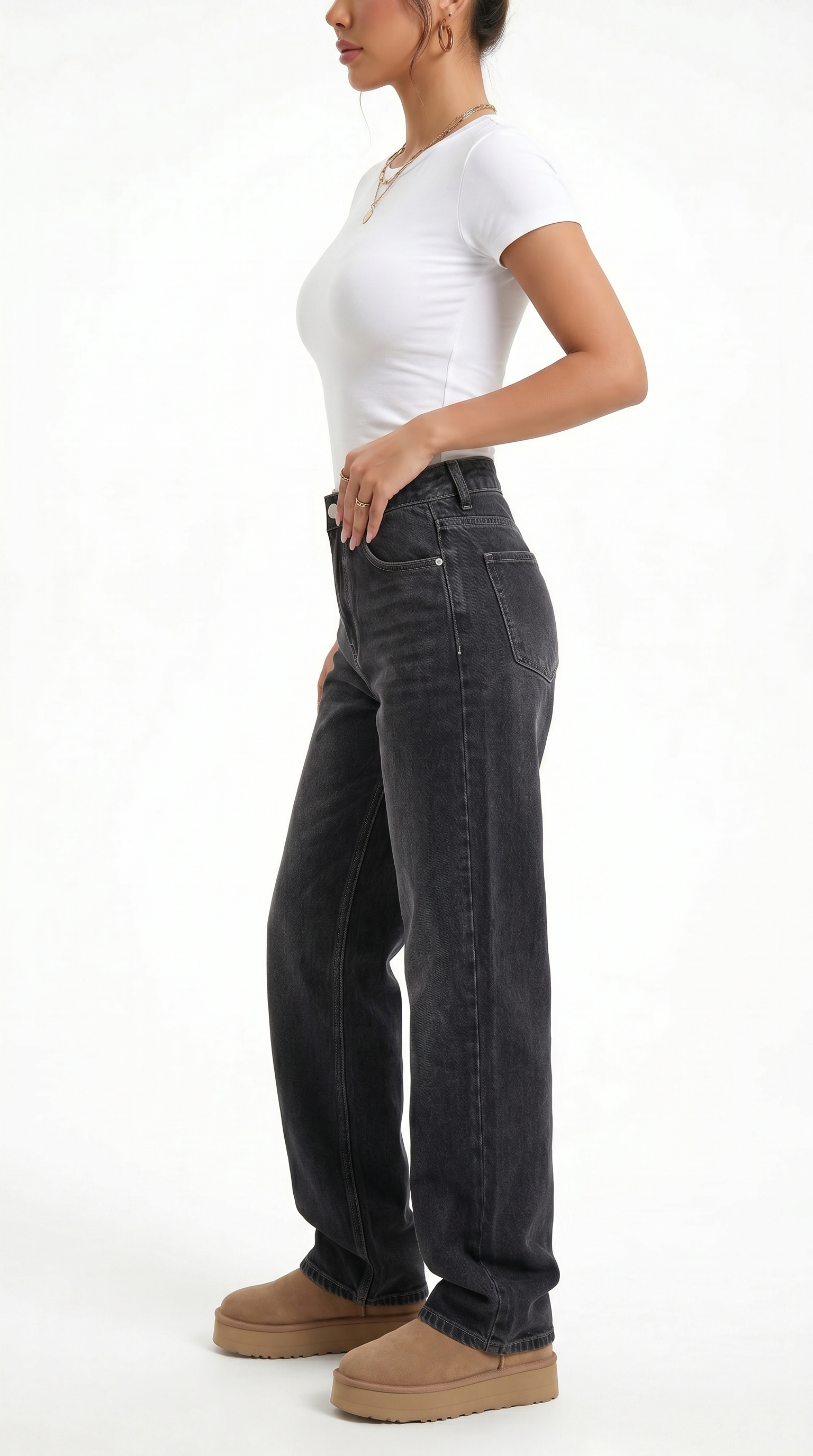 Person wearing black jeans and a white top on a white background, Relaxed Fit cotton jeans from Meleche Fashion USA or Meléche (short as (Mé))